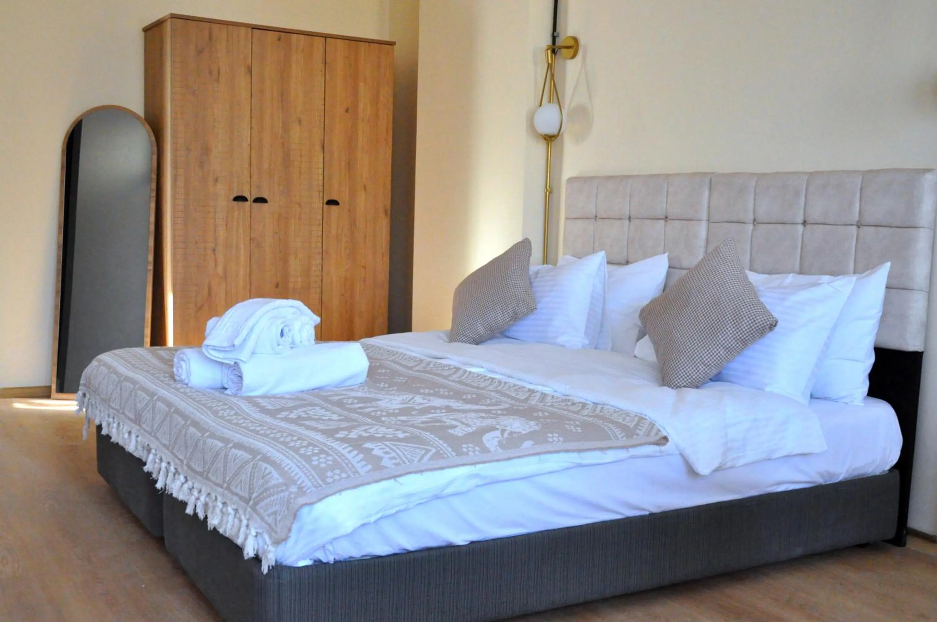 Bed in Golden Door Hotel