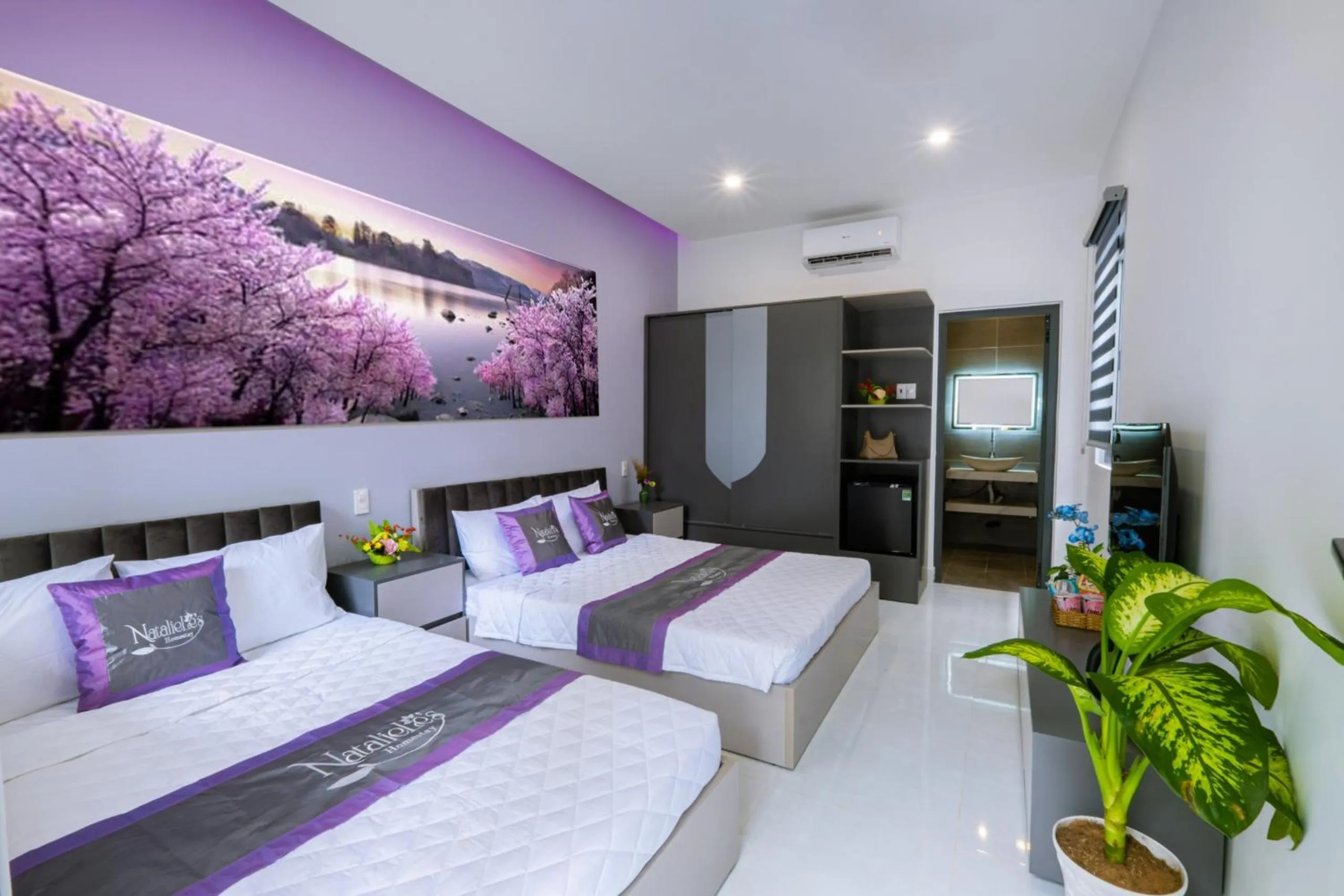 Communal lounge/ TV room, Bed in NatalieLe's Homestay