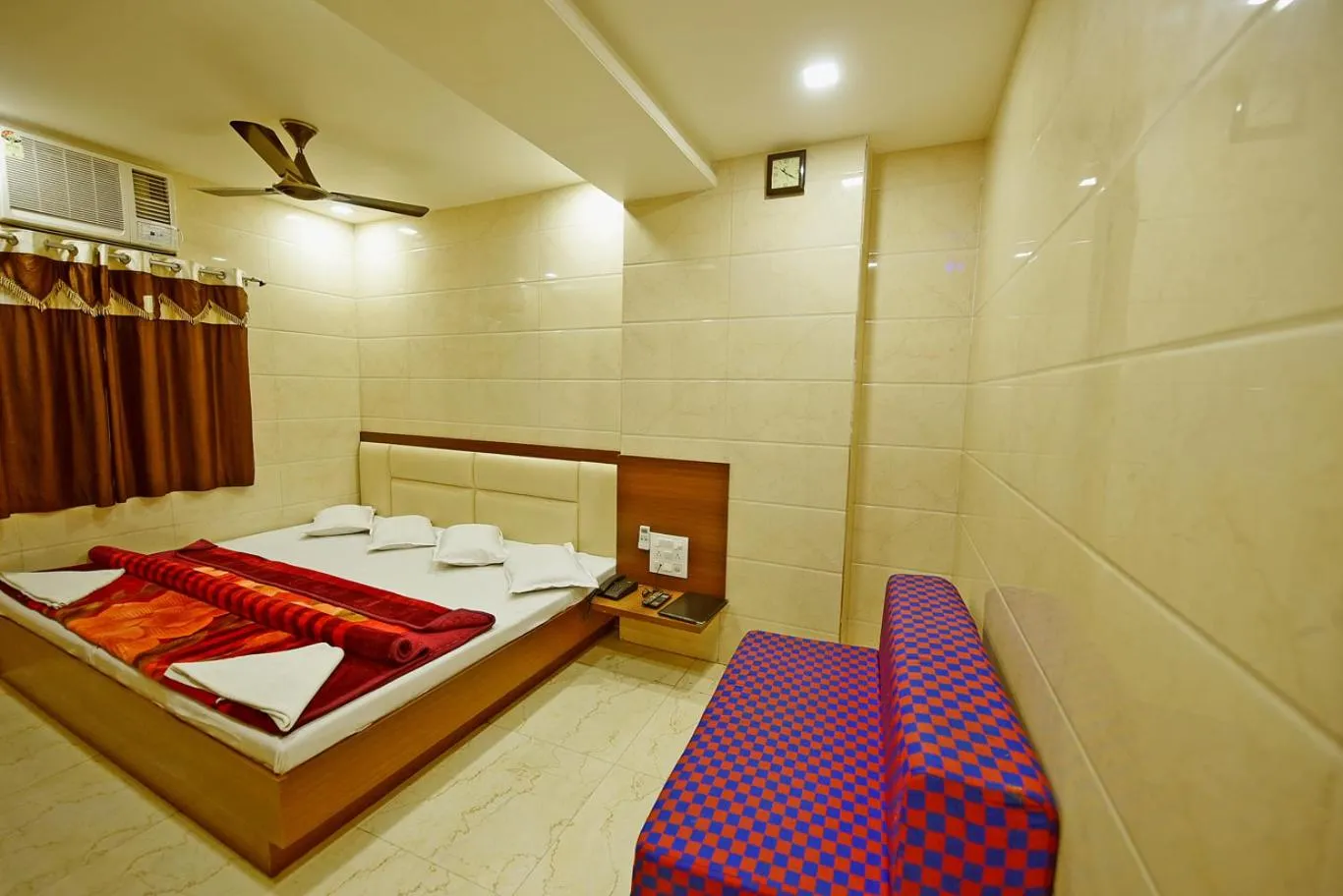 Bed in BABA GUEST HOUSE AJMER