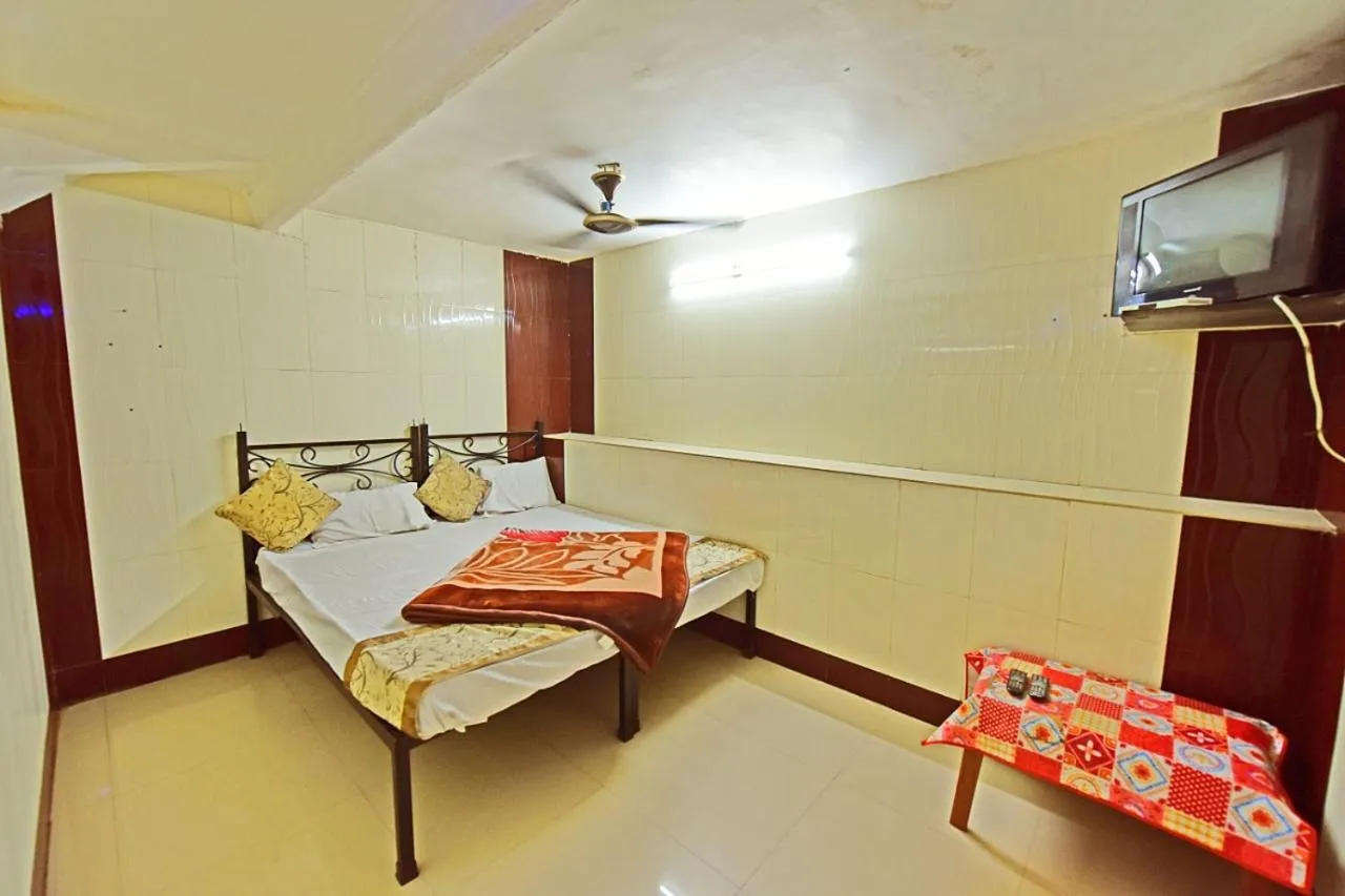 Bed in BABA GUEST HOUSE AJMER