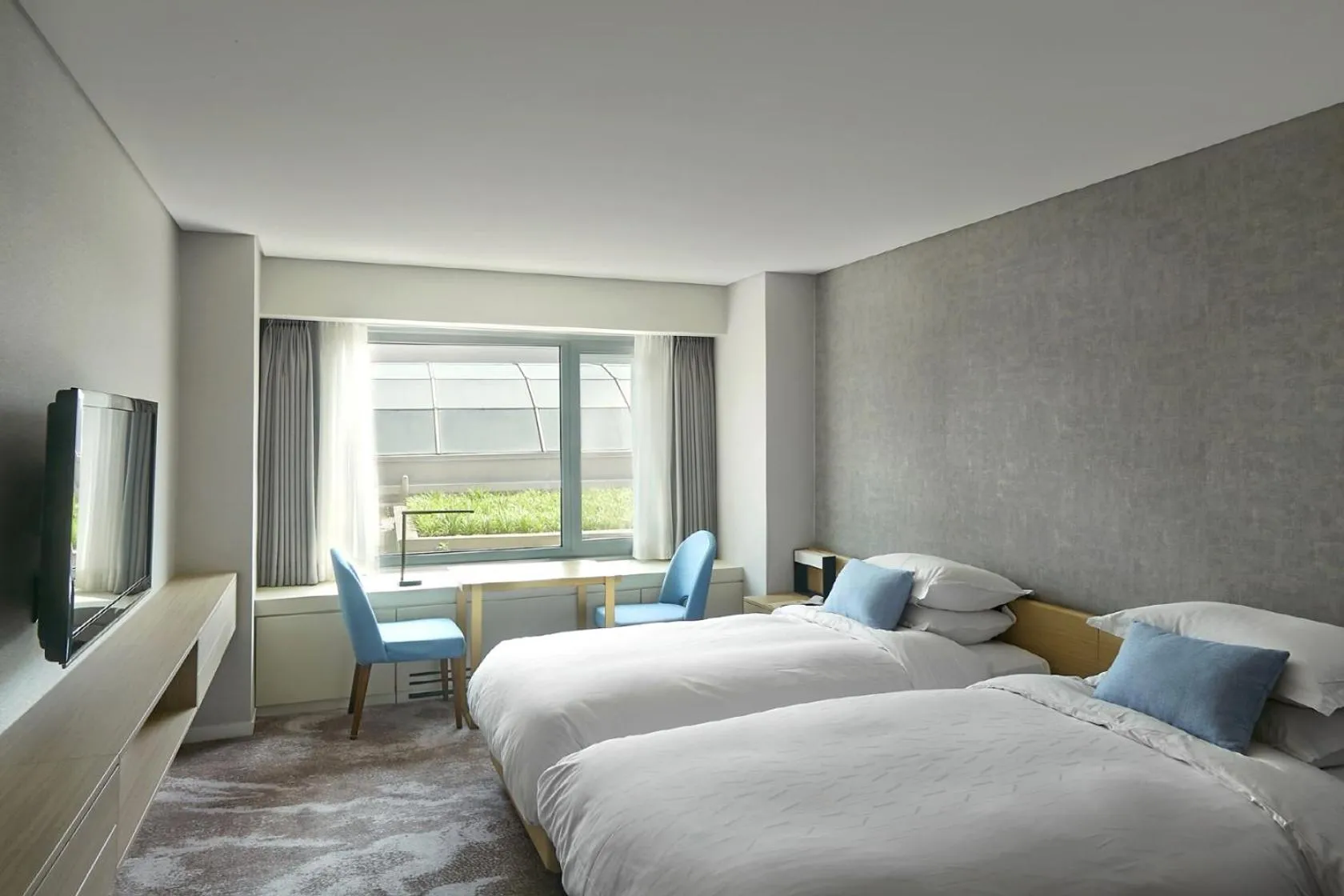 Bed in Grand Walkerhill Seoul