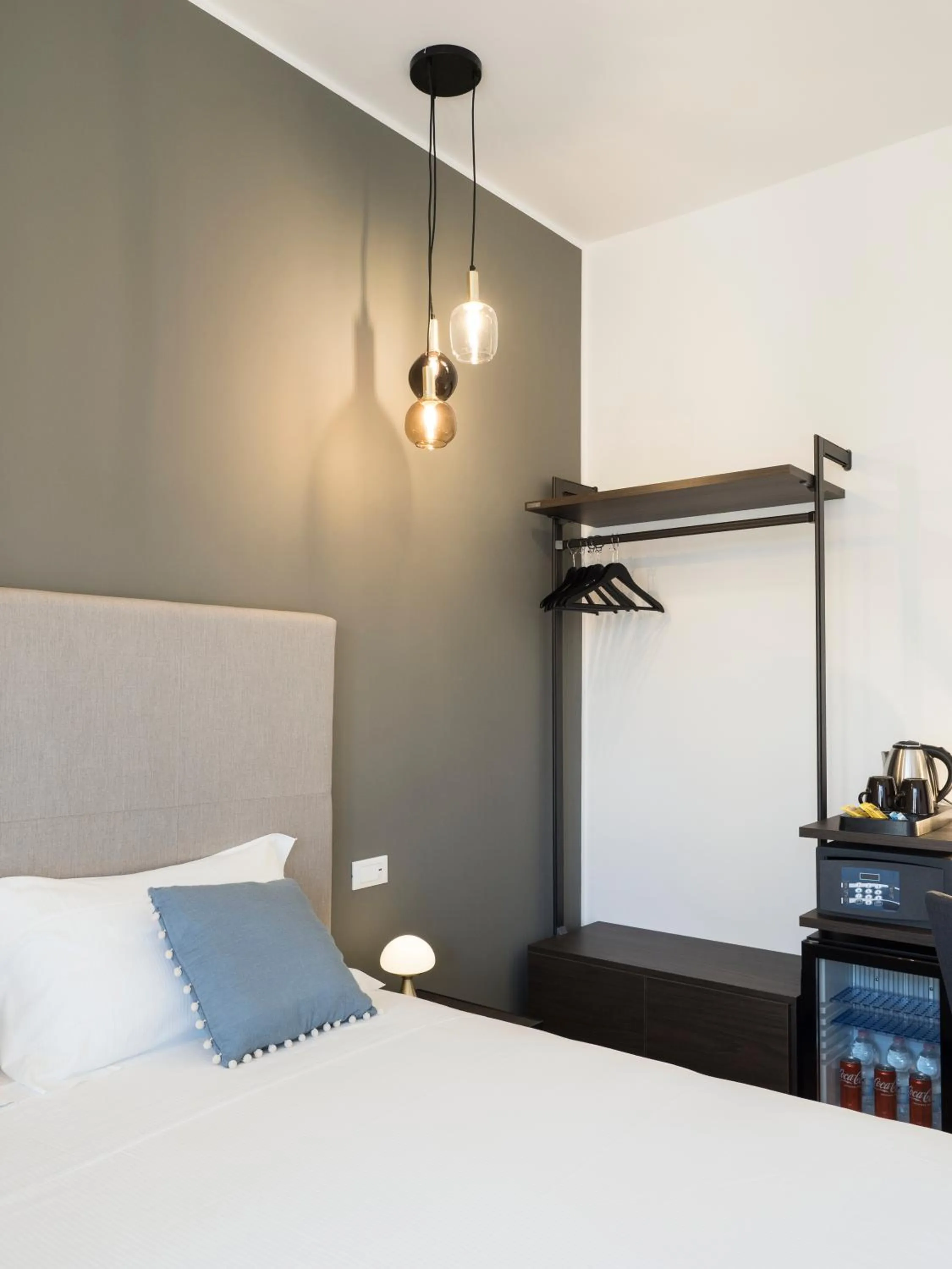 Bed in Savoia Rooms Roma