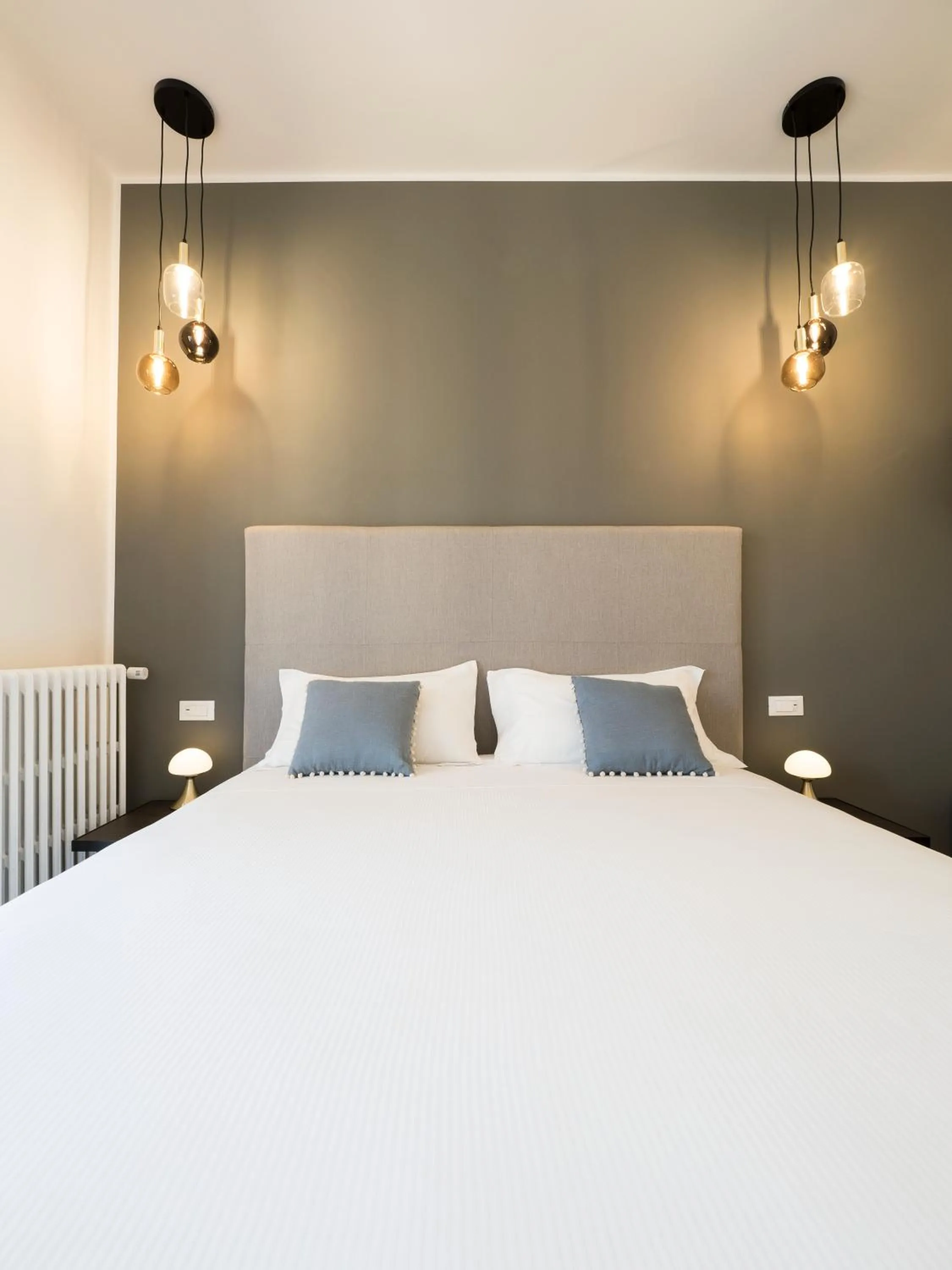 Bed in Savoia Rooms Roma