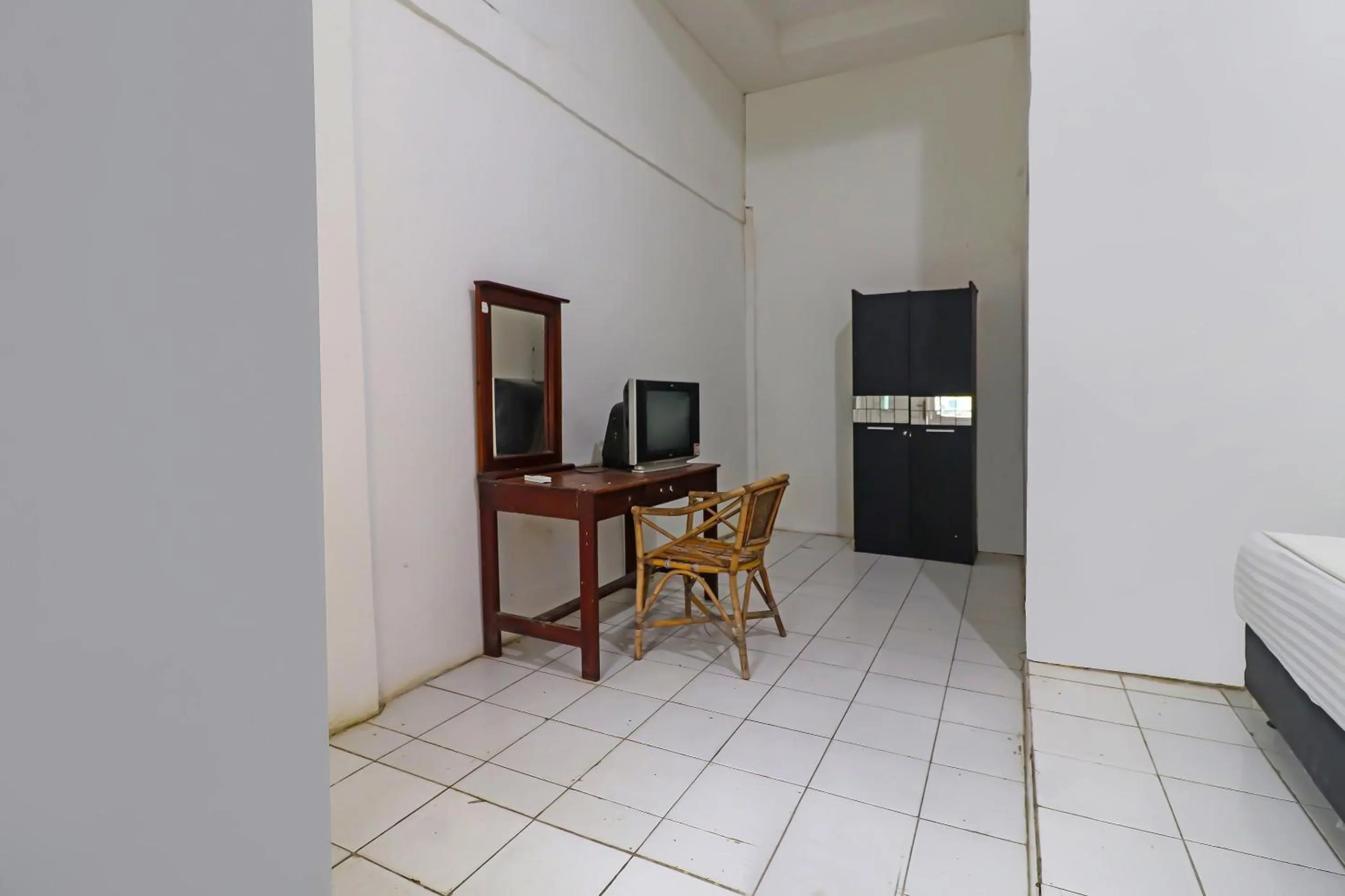 Bedroom in Hotel O Wisma Permata Syariah