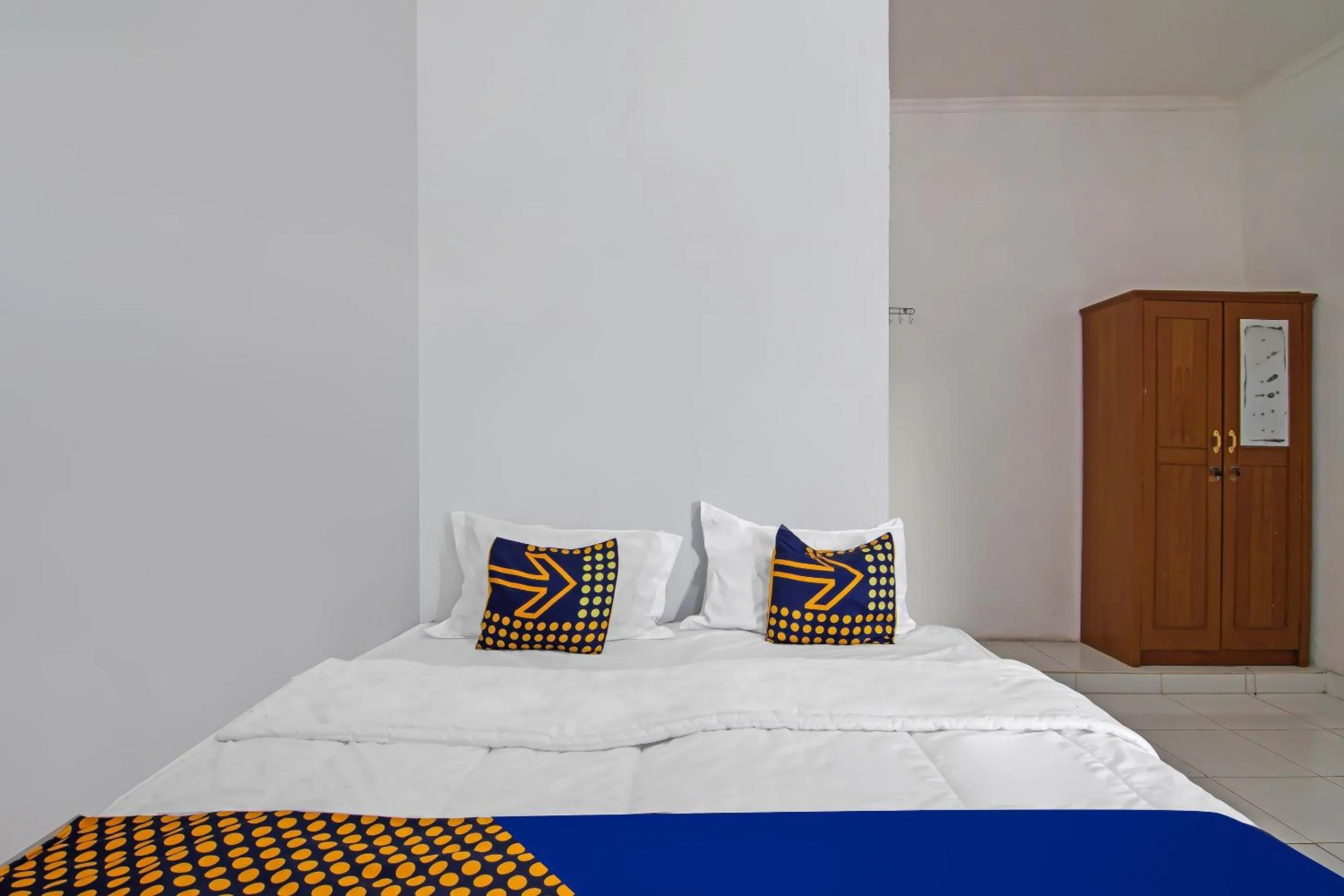 Bedroom in SPOT ON 92498 Fanni Homestay