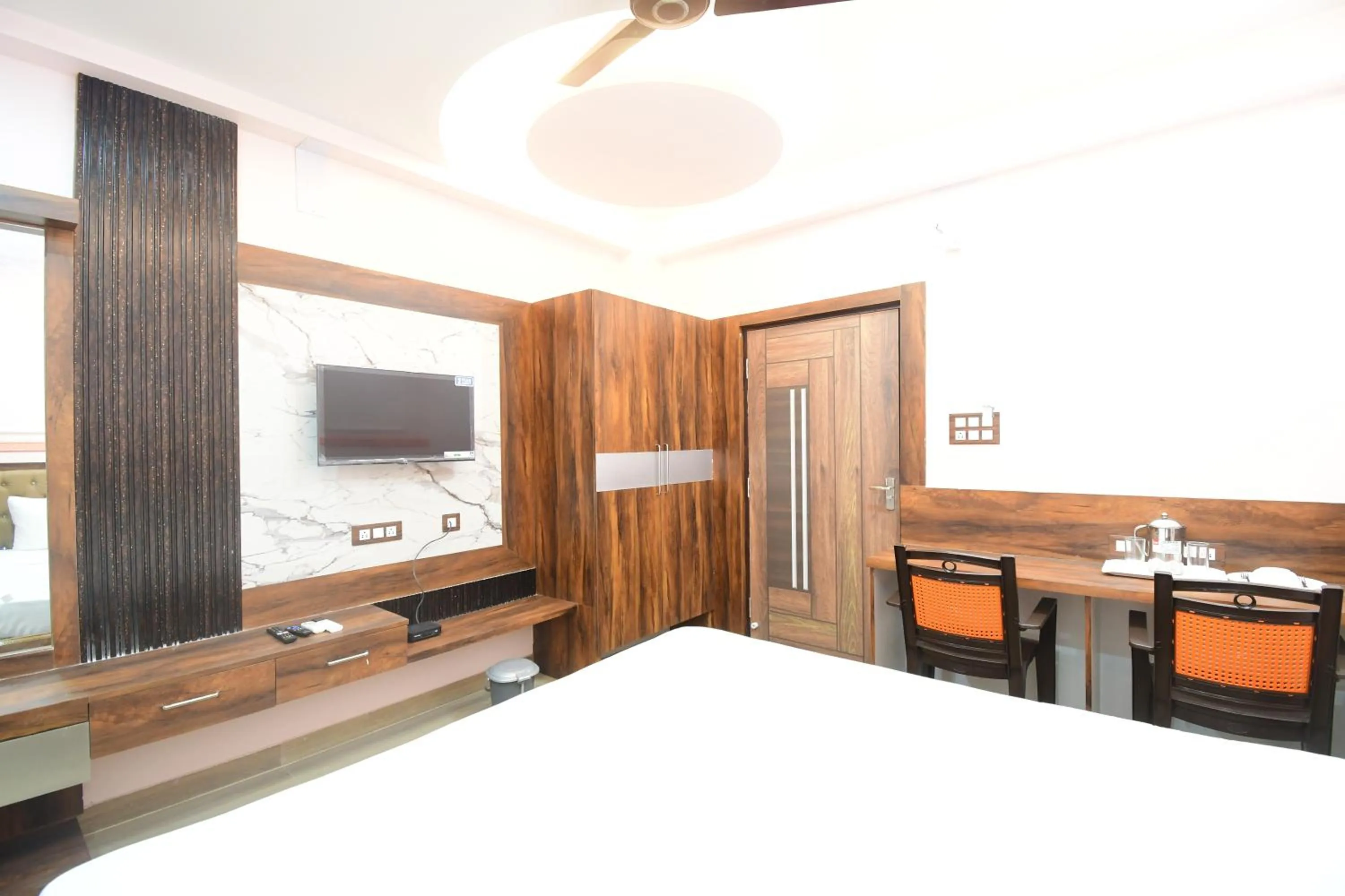 TV and multimedia, Bed in HOTEL SUSHREE INTERNATIONAL