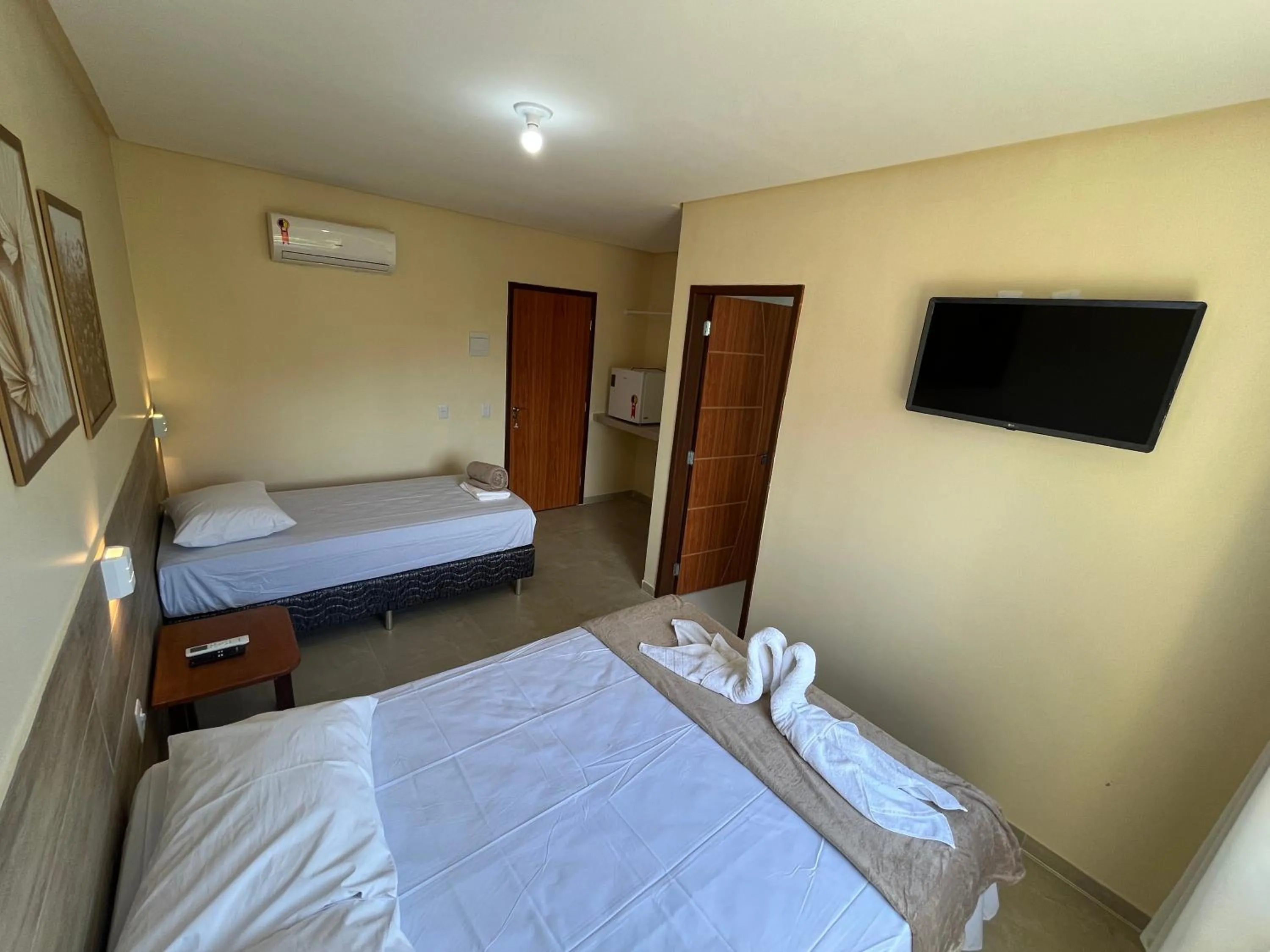 Bed in Pousada Donna Maraka