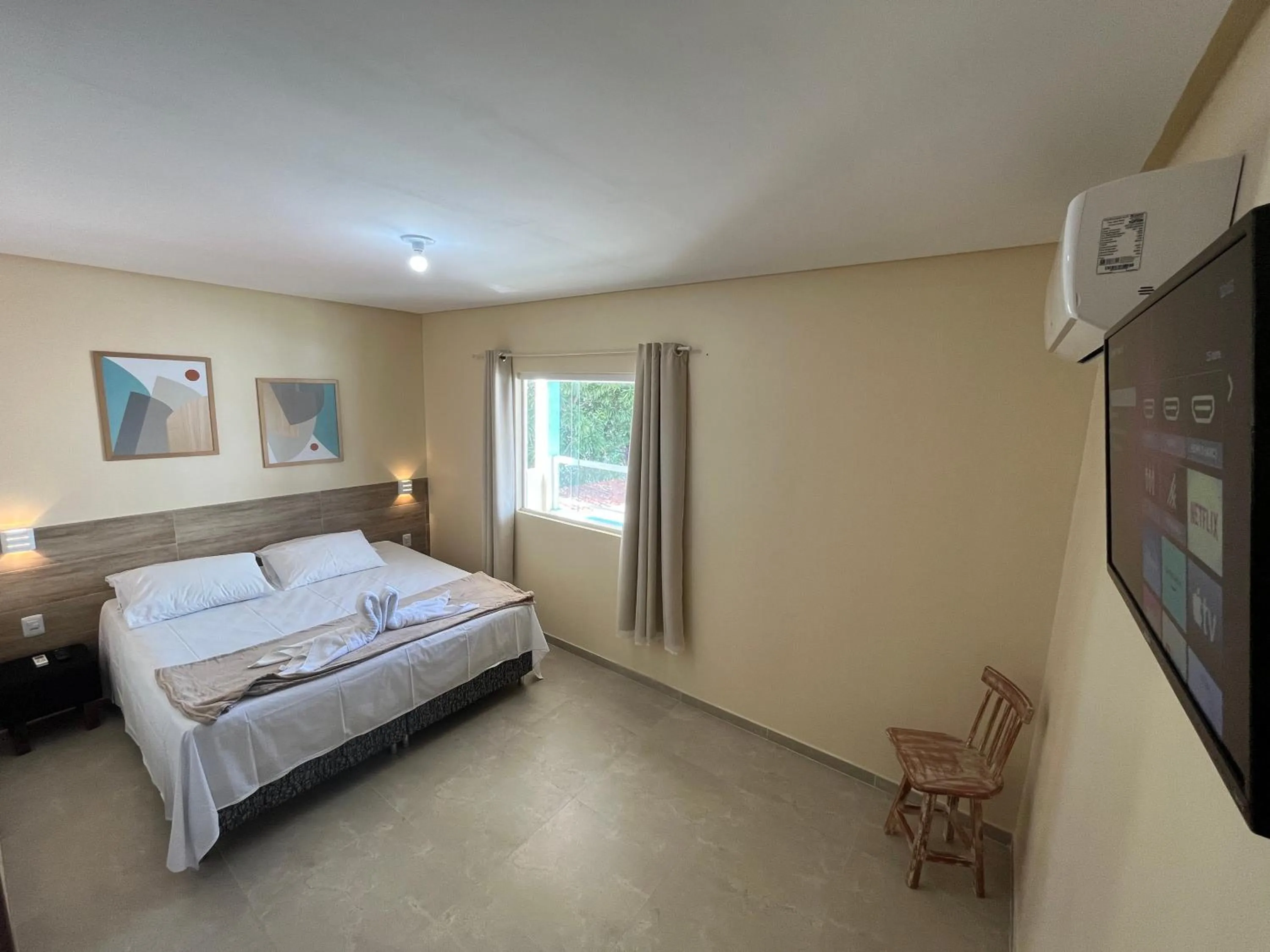 Bed in Pousada Donna Maraka