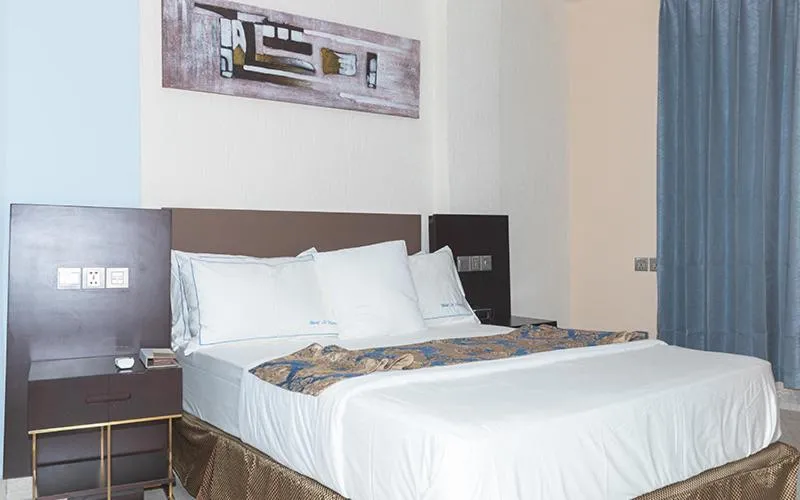 Bed in Hotel Le Figaro