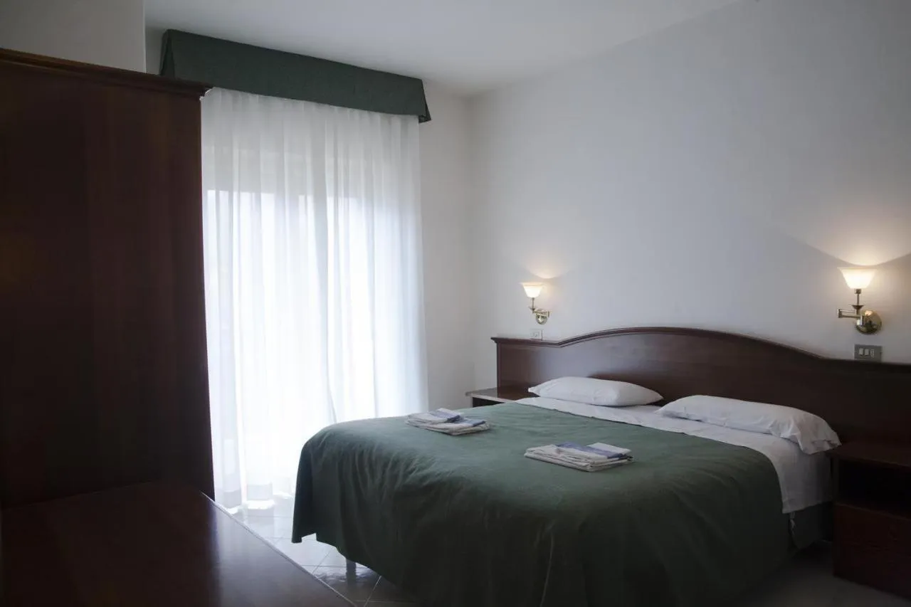 Bed in Hotel Aquila