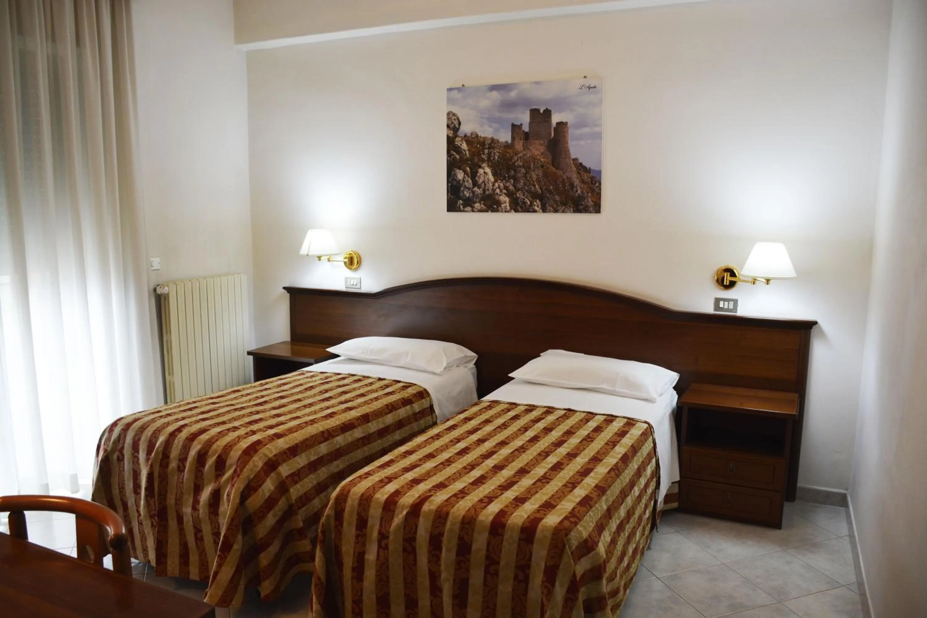 Bed in Hotel Aquila