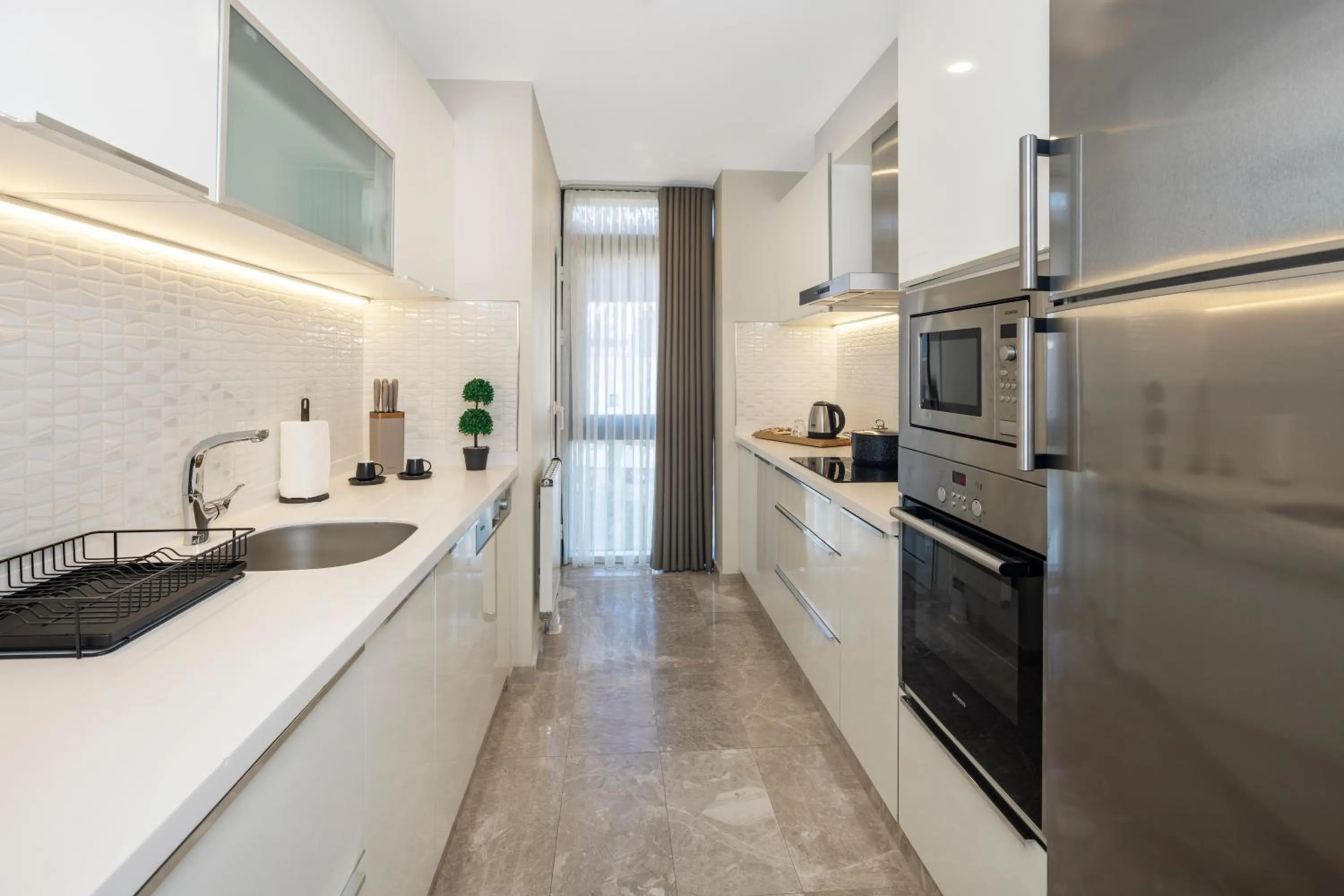 Kitchen or kitchenette in Mayar Residence Hotel