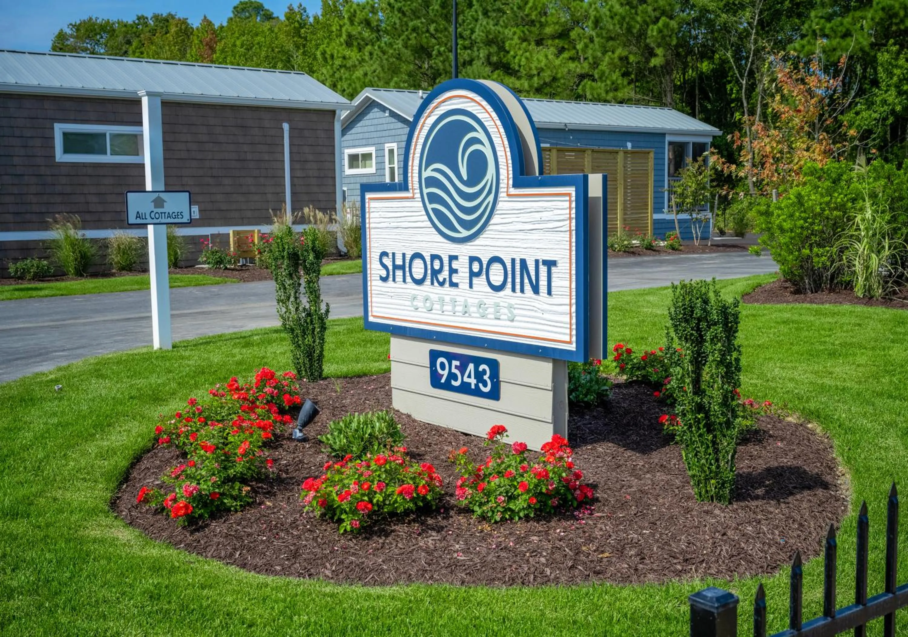 Property logo or sign in Shore Point Cottages