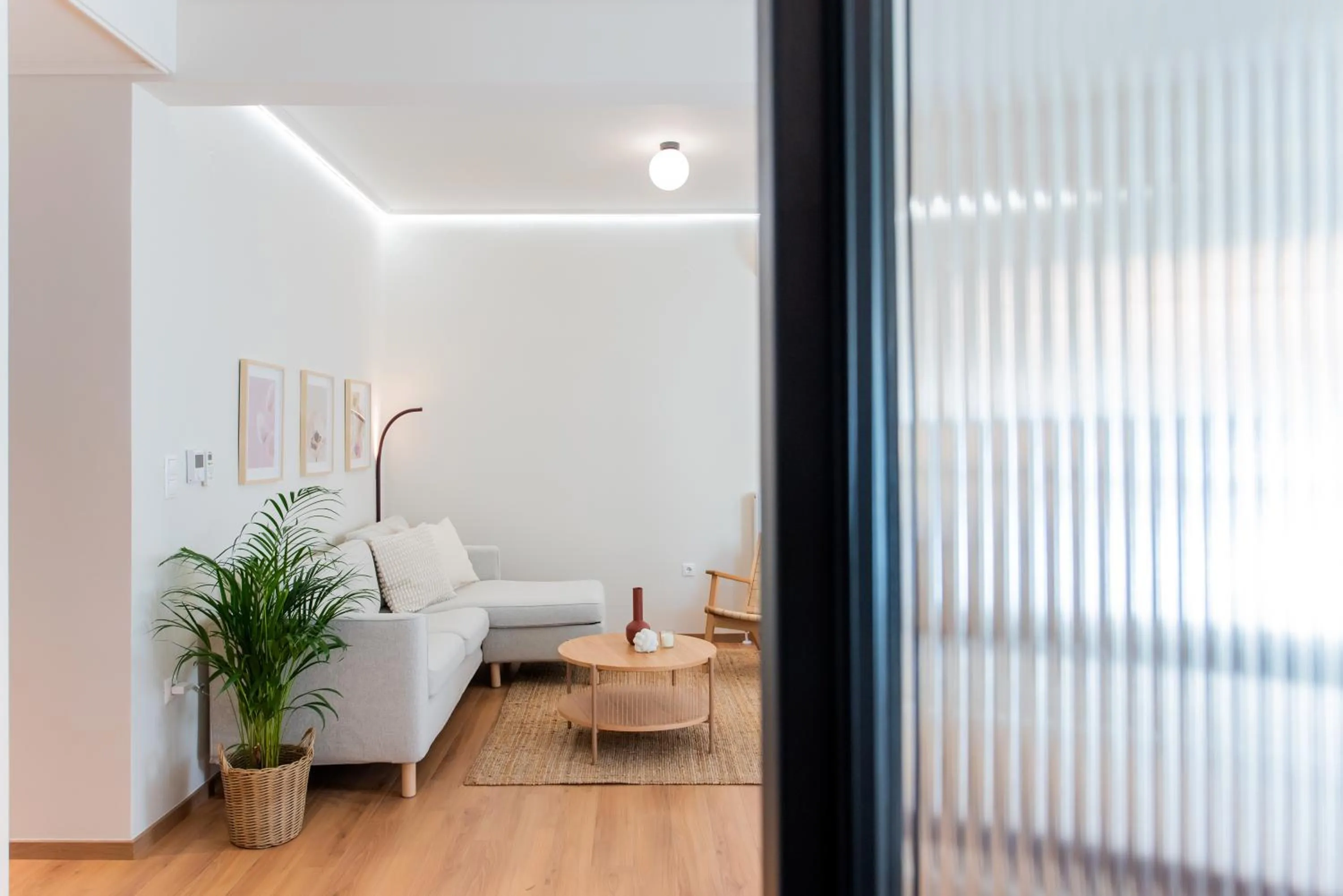 Living room, Bed in White Lotus by halu! Apartments