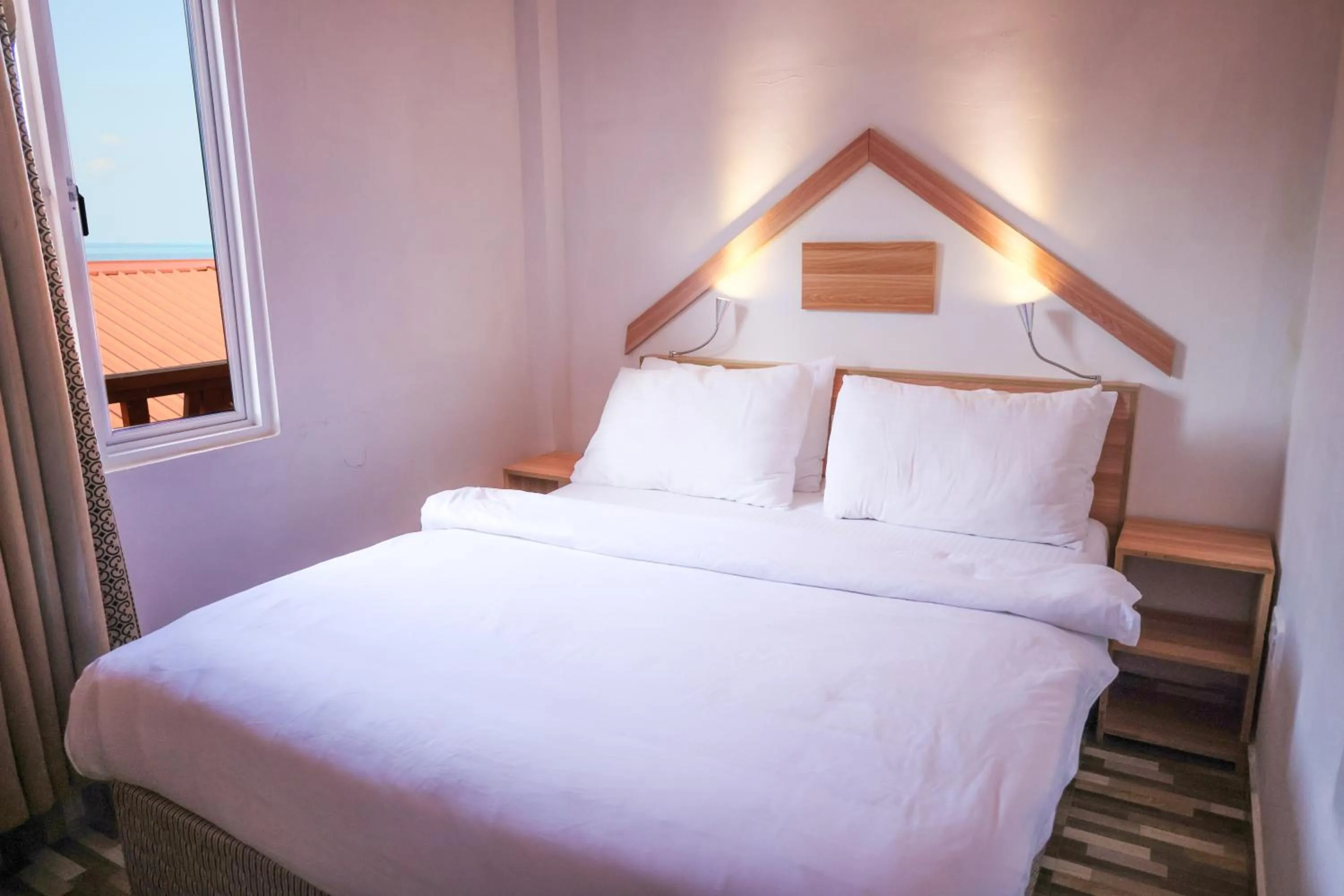 Bed in Golhaaviewinn