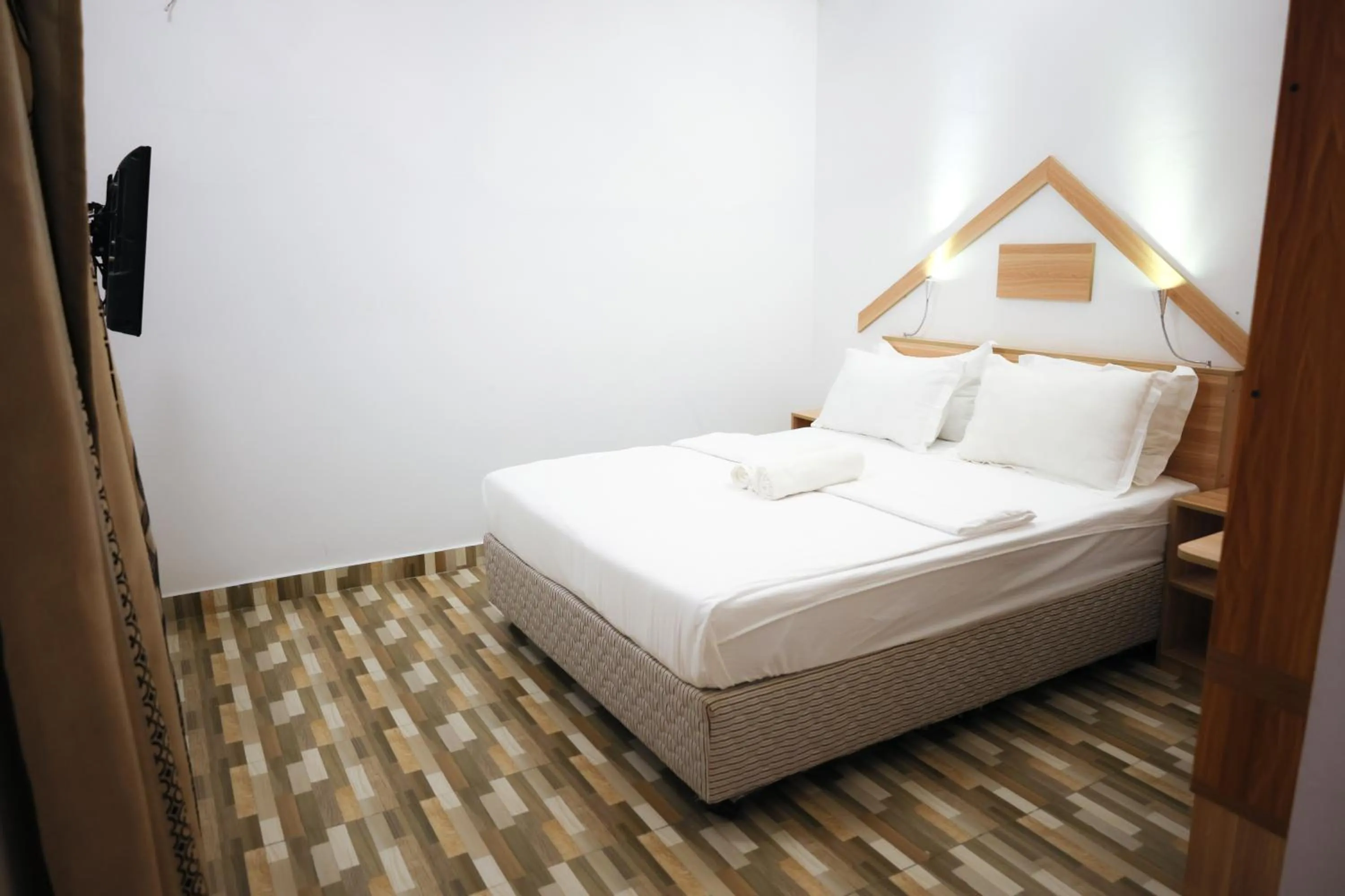 Bed in Golhaaviewinn