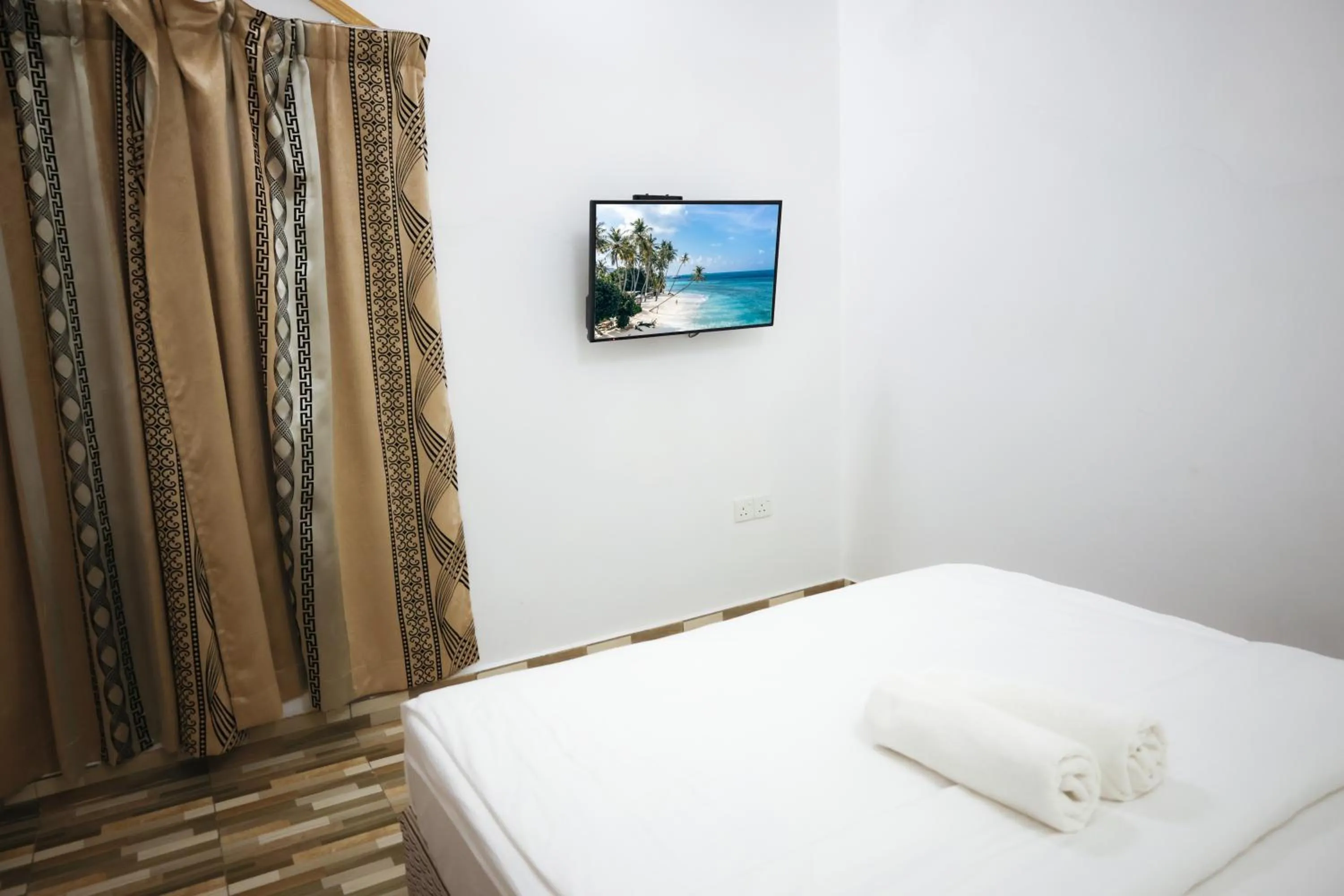 Bed in Golhaaviewinn