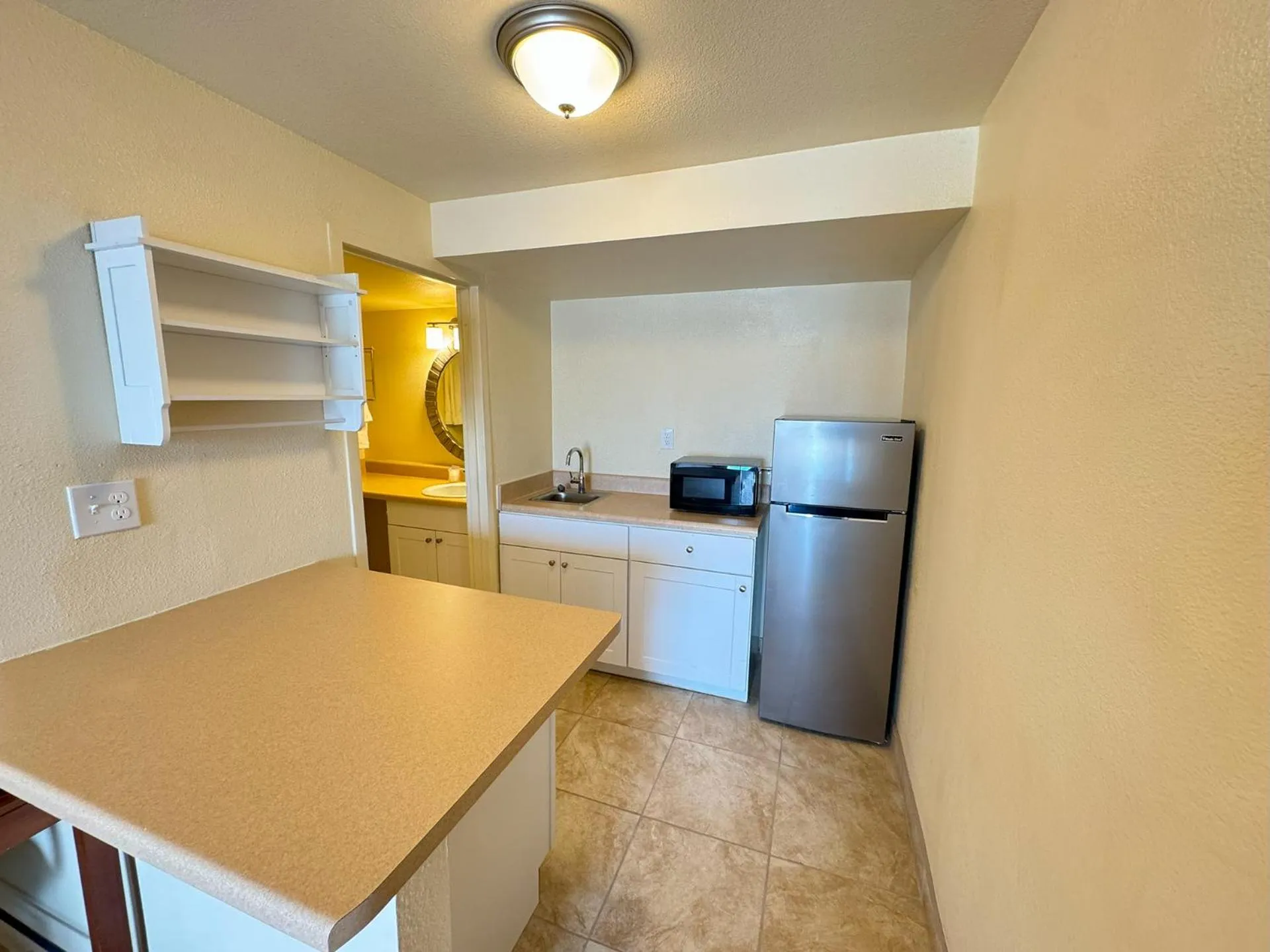 Kitchen or kitchenette in Big Chile Inn & Suites