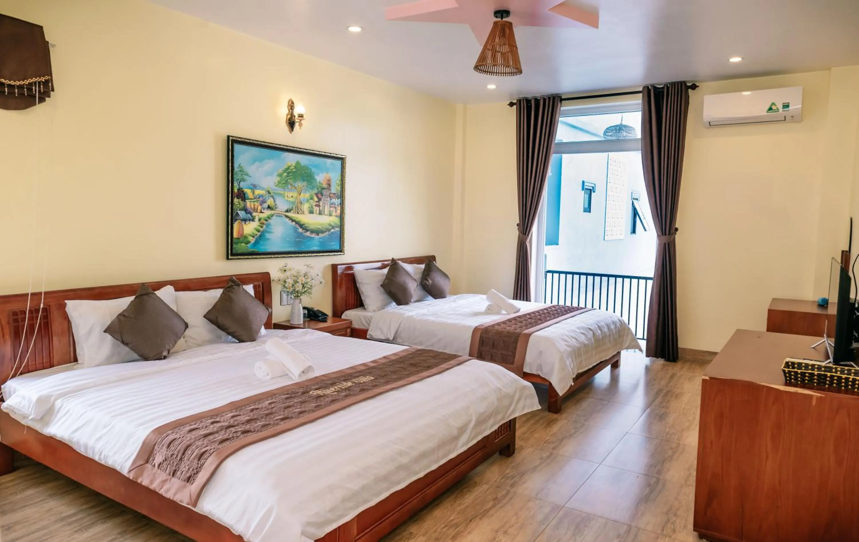 Bed in Orchid Riverside Villa