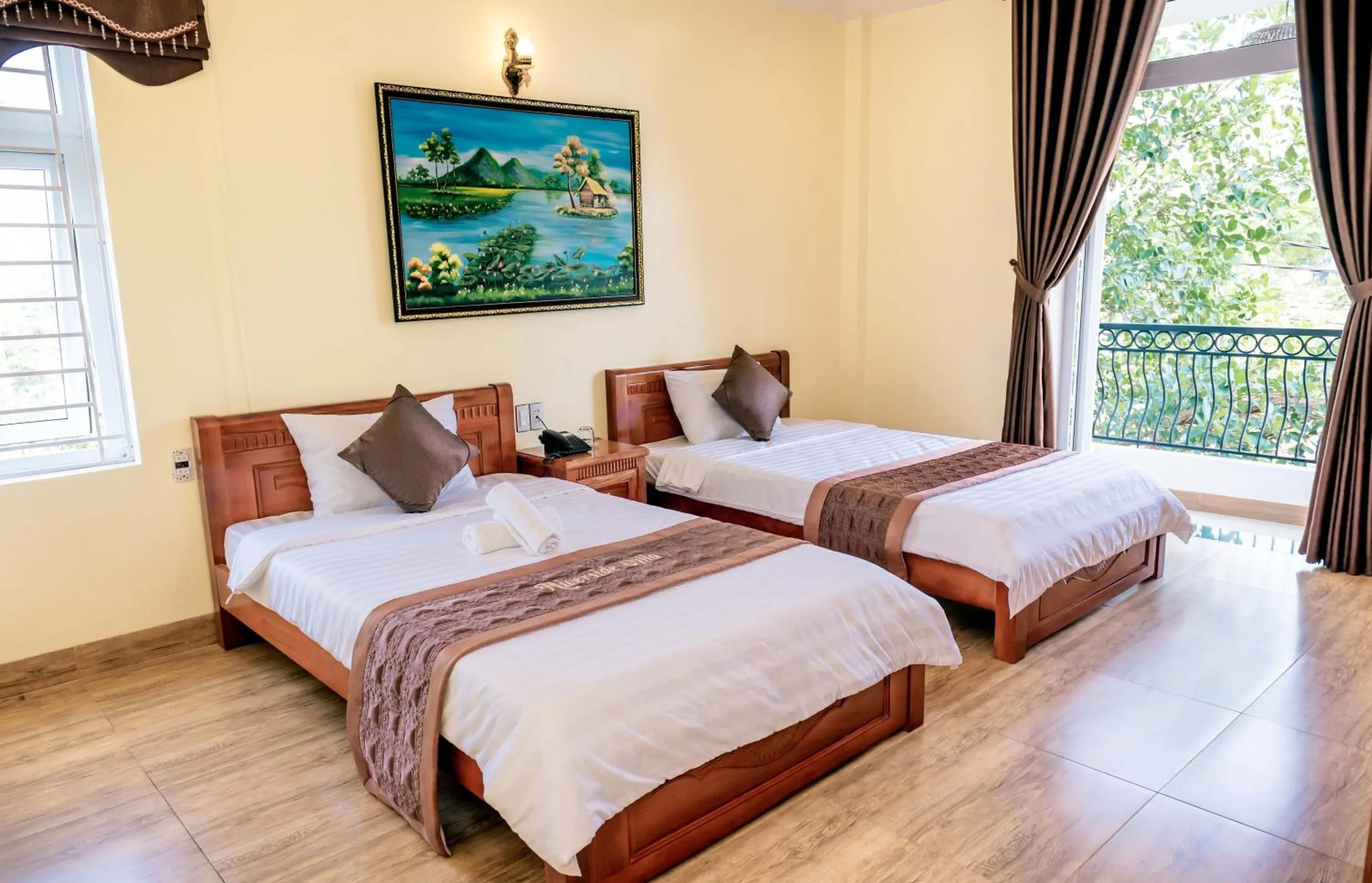 Bed in Orchid Riverside Villa