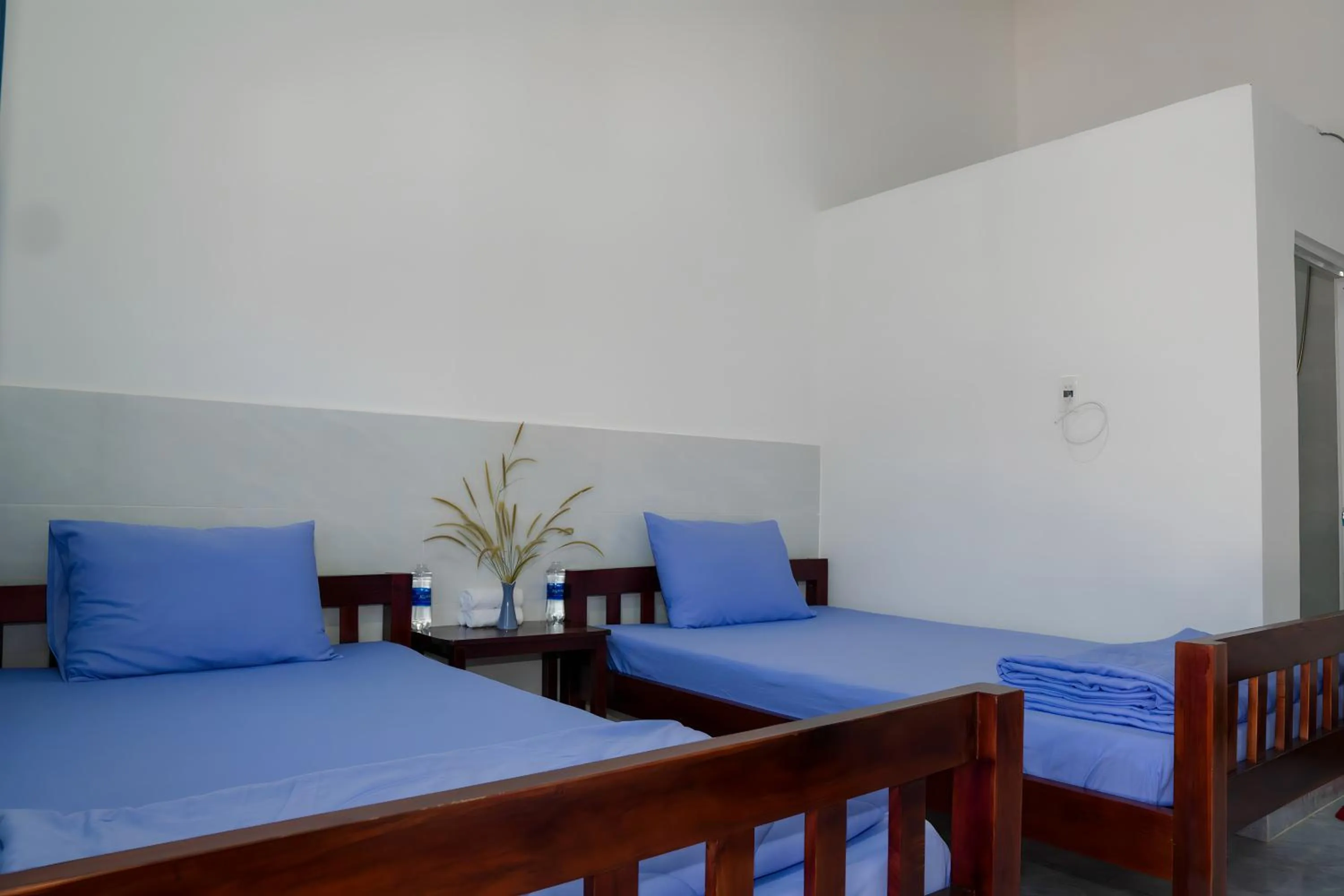 Bed in Nhà Nghỉ Vườn Oải Hương LAVENDER GARDEN GUEST HOUSE