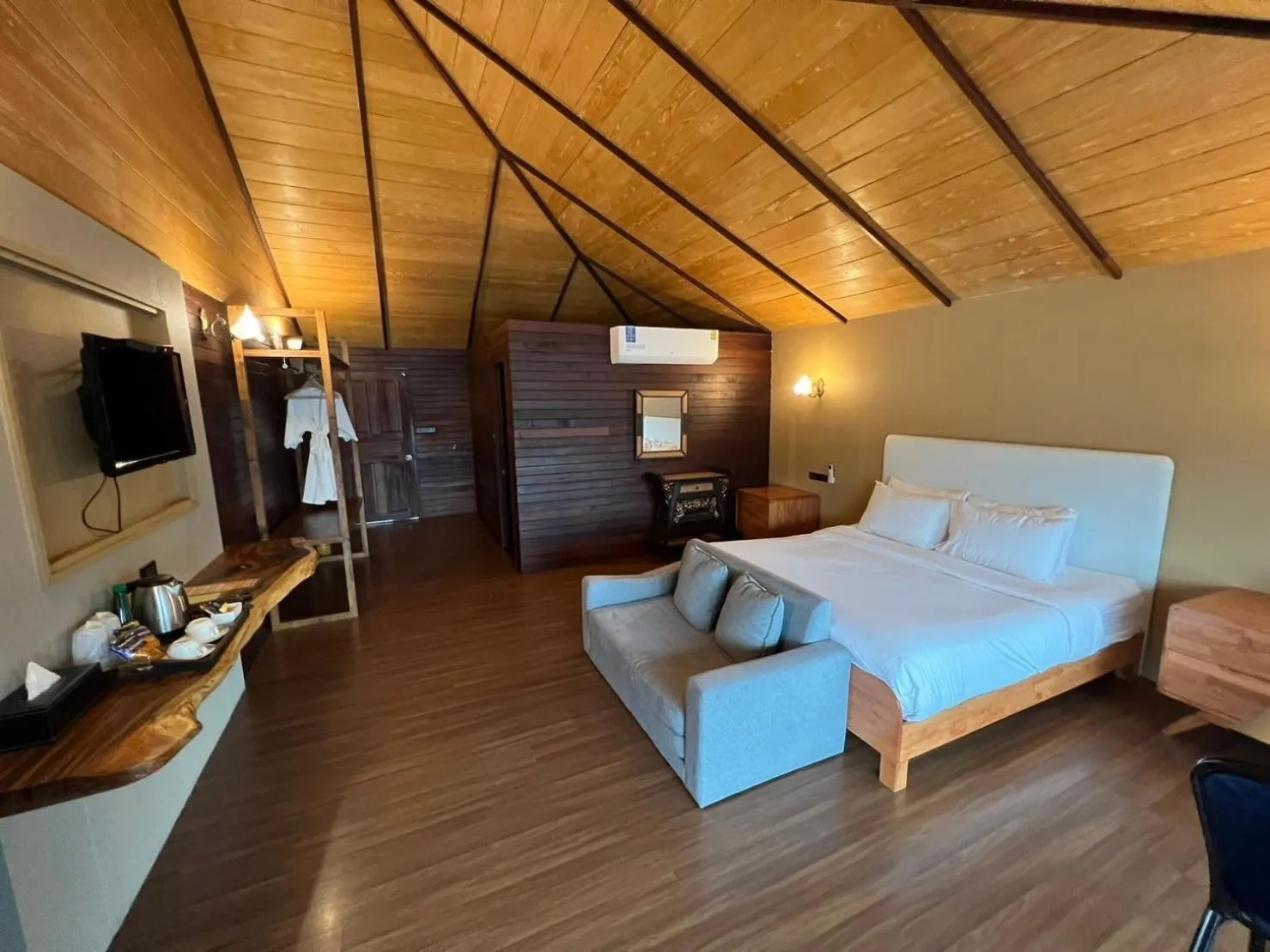 Communal lounge/ TV room, Bed in Ruknam Resort