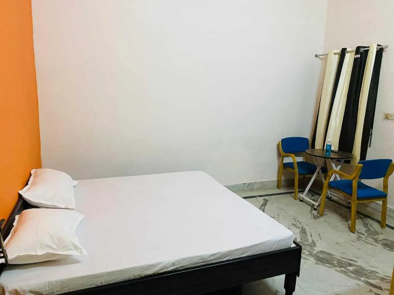 Bedroom in Hotel O Home Aradhya Residency