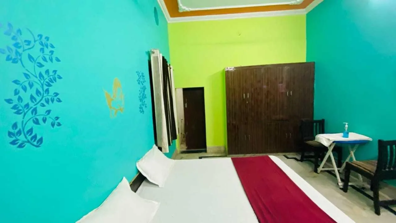 Bedroom in Hotel O Home Aradhya Residency