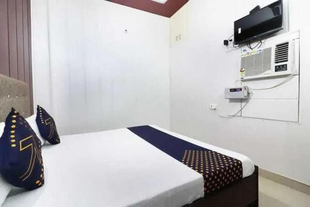 Bedroom in Hotel O Home Aradhya Residency