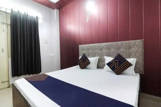 Bedroom in Hotel O Home Aradhya Residency