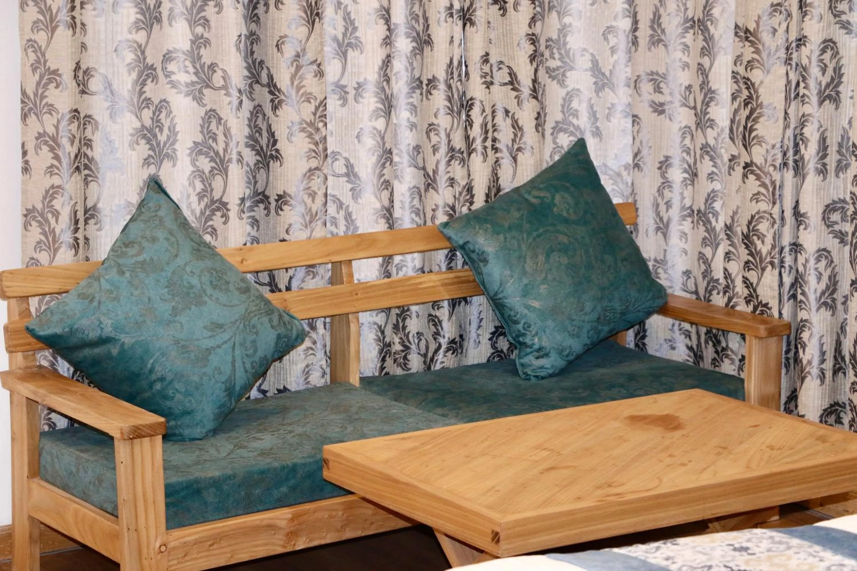 Seating area in Hotel Palam Hills