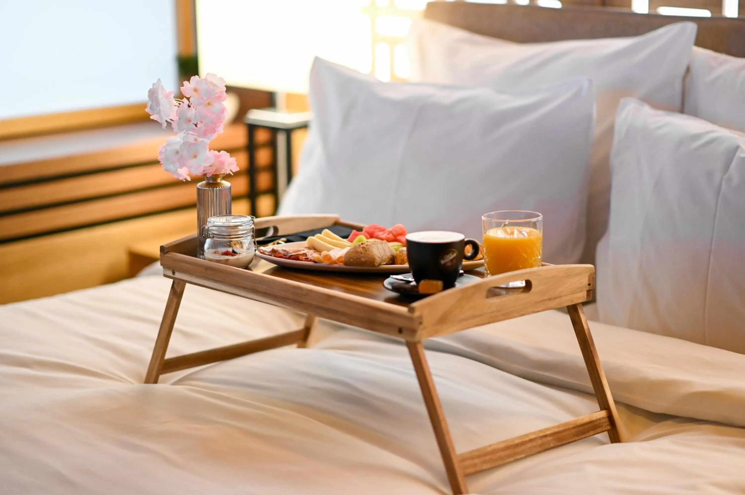 Bed in Hanami Design Hotel
