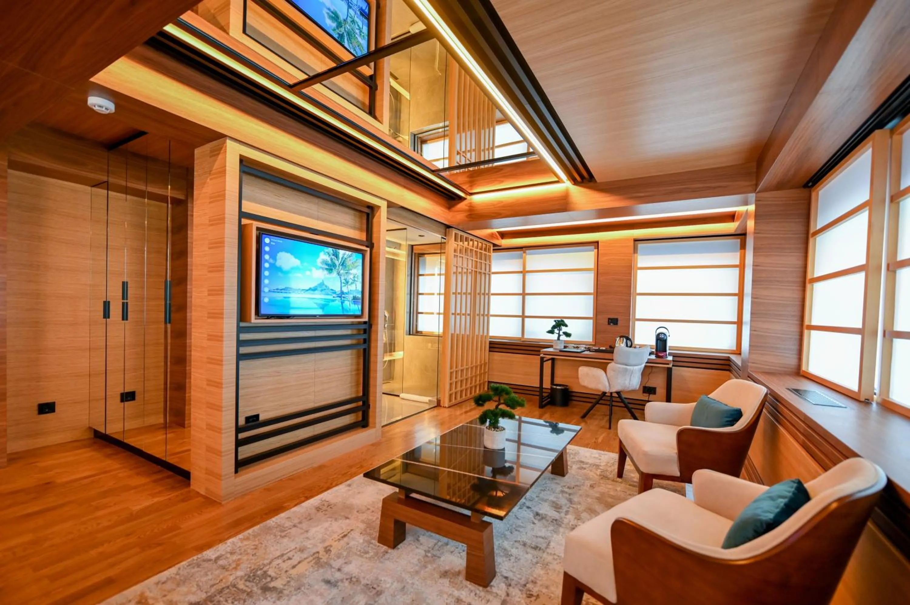 Communal lounge/ TV room in Hanami Design Hotel