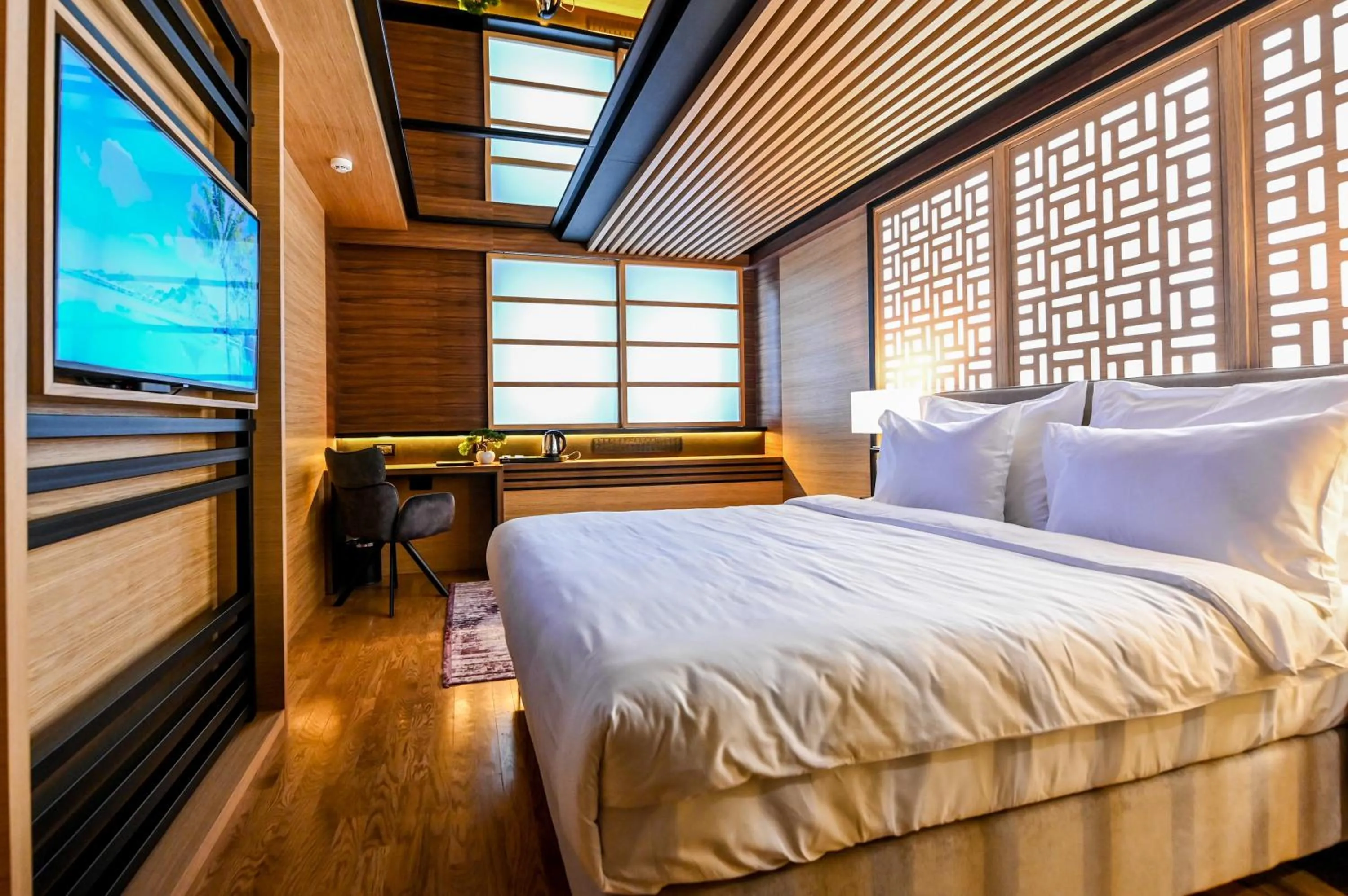 Bed in Hanami Design Hotel