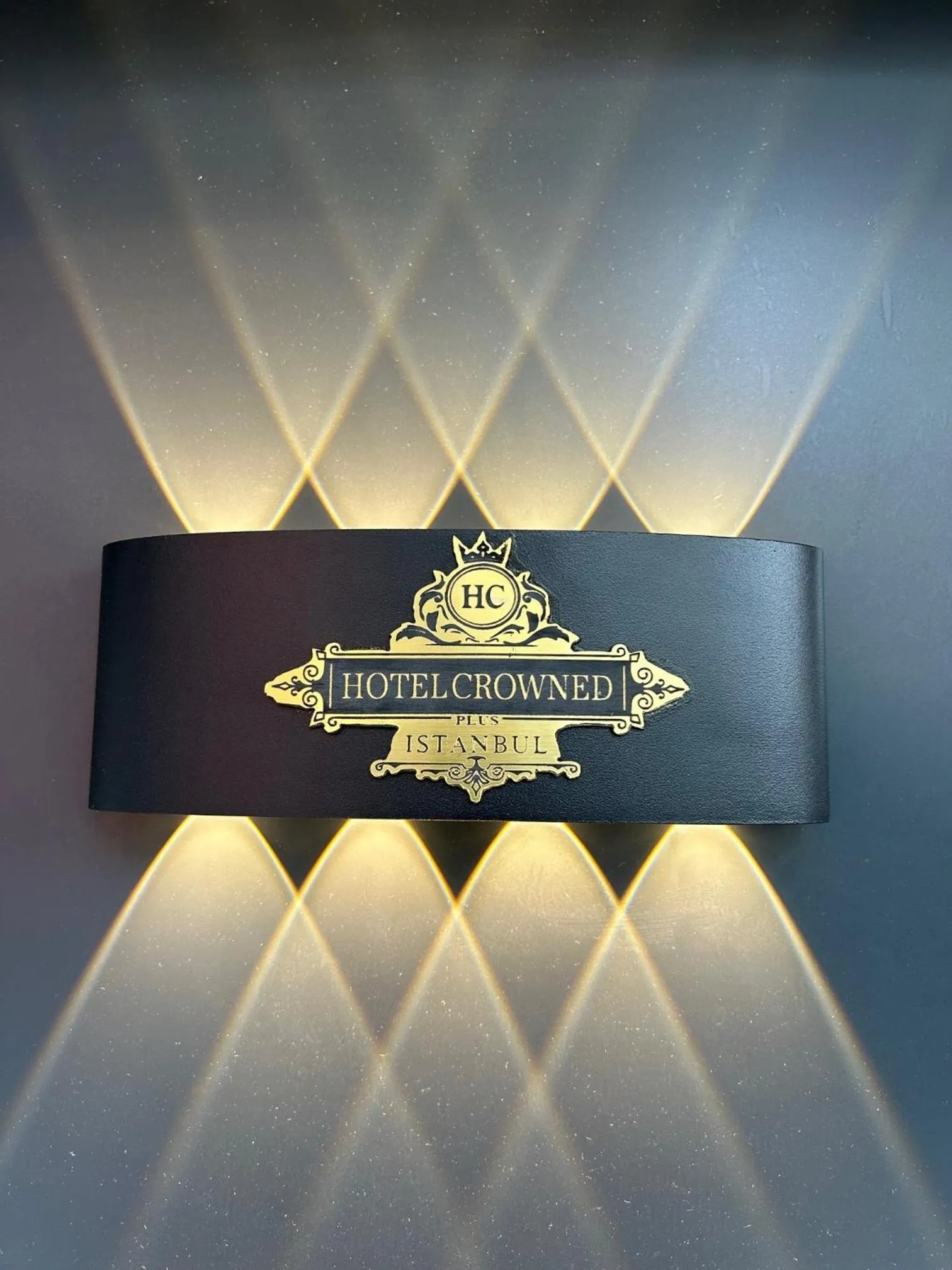 Property logo or sign in Crowned Plus Hotel