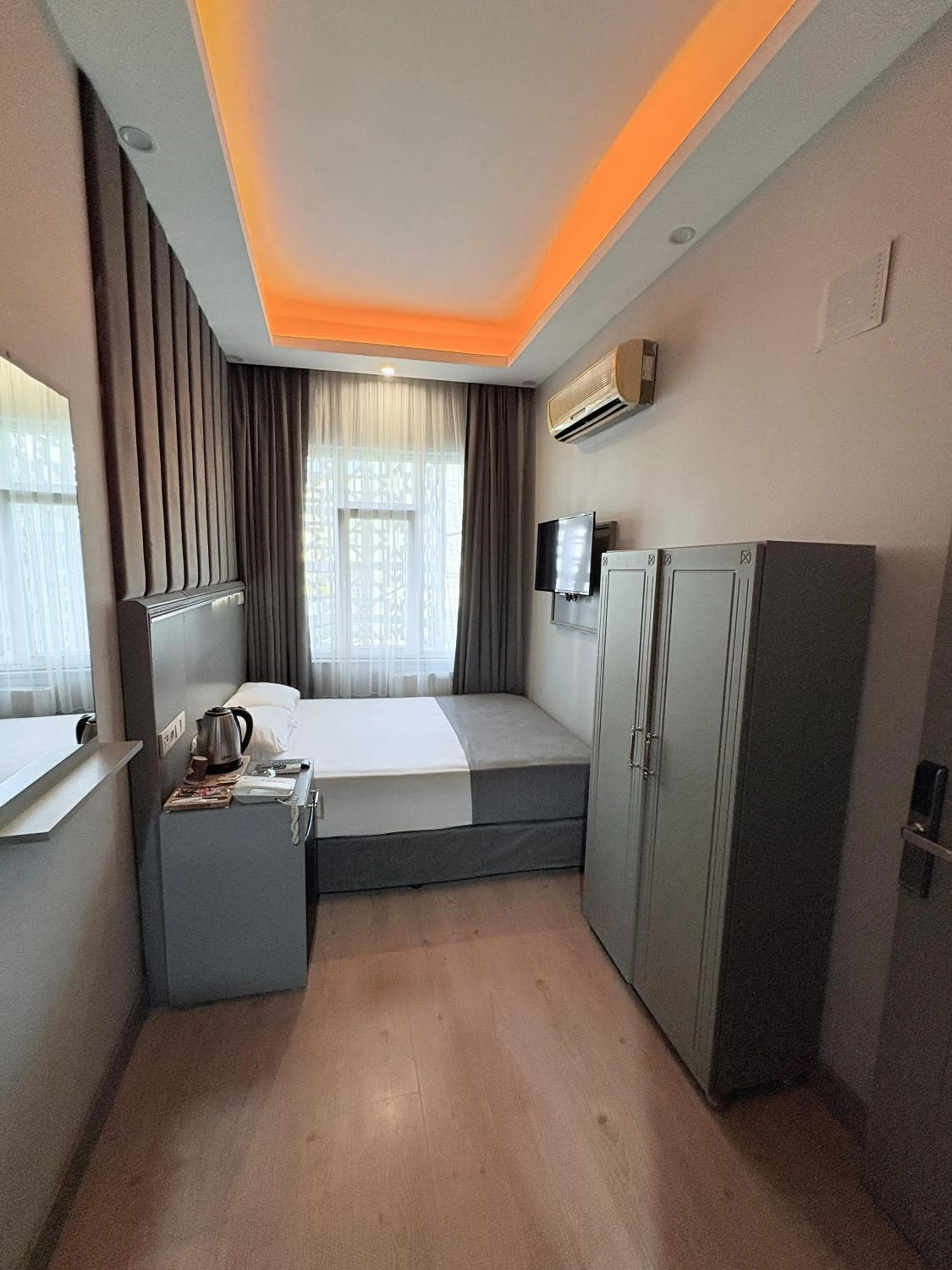 Bed in Crowned Plus Hotel