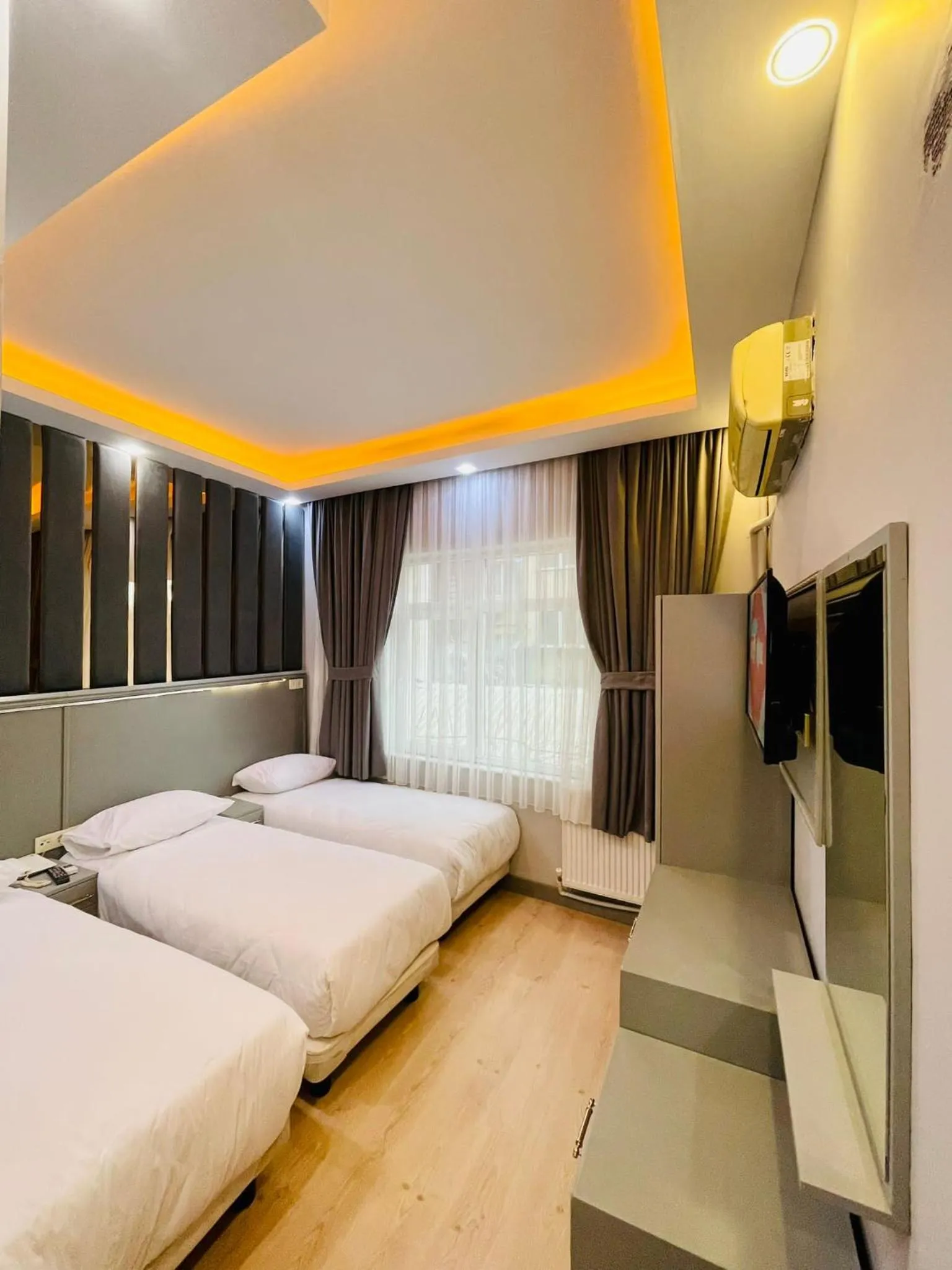 Bed in Crowned Plus Hotel