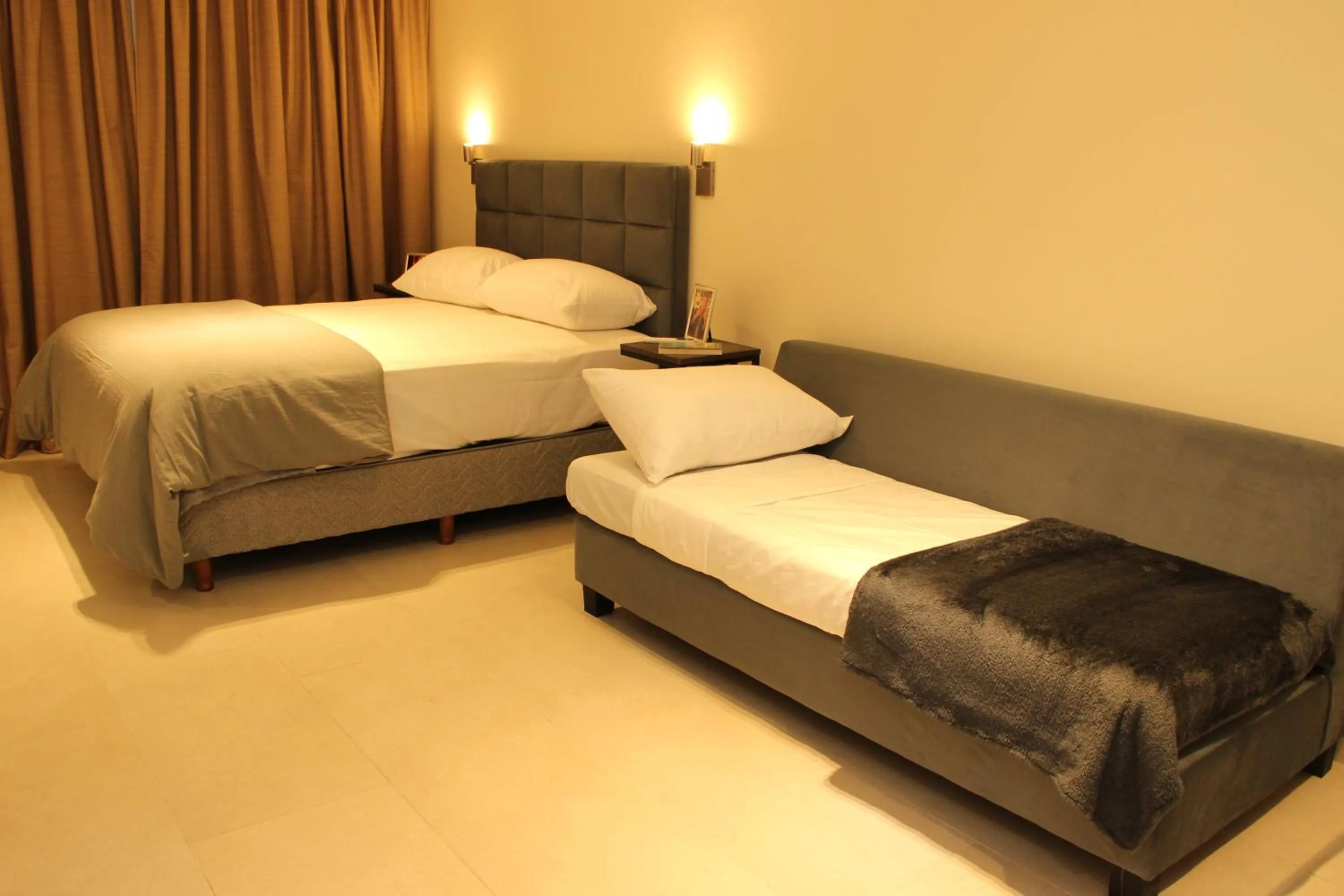 Photo of the whole room, Bed in In House BA - College