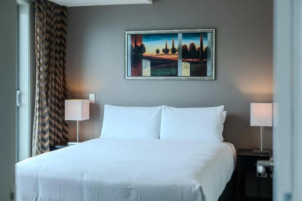 Bed in 70 Tory Apartment Hotel