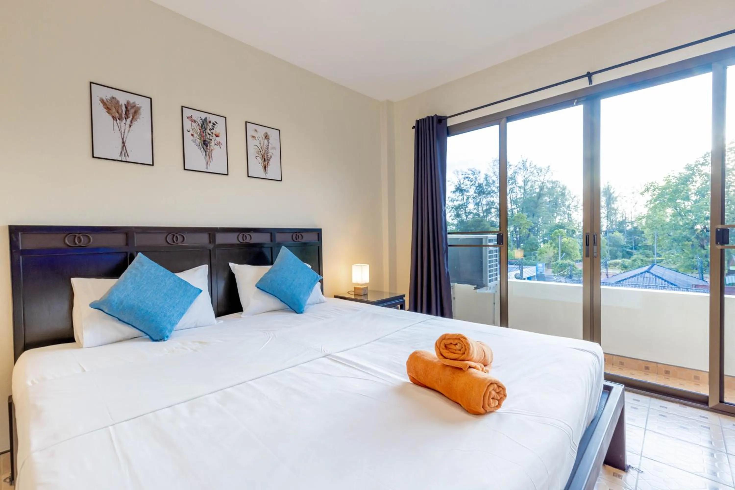 Bed in Club22 Kamala Suites, Kamala Beach