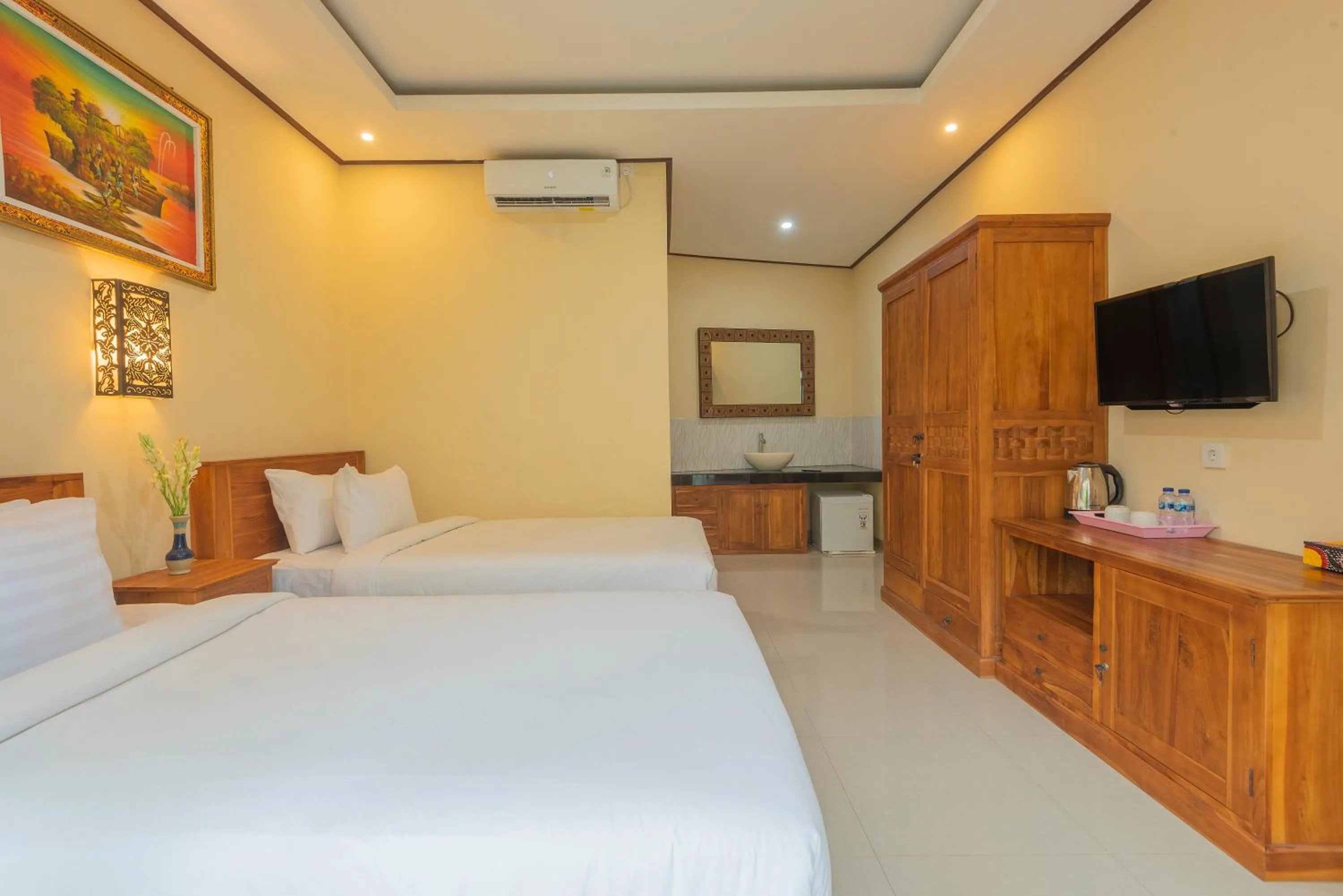 Bed in Liliy Guest House Legian