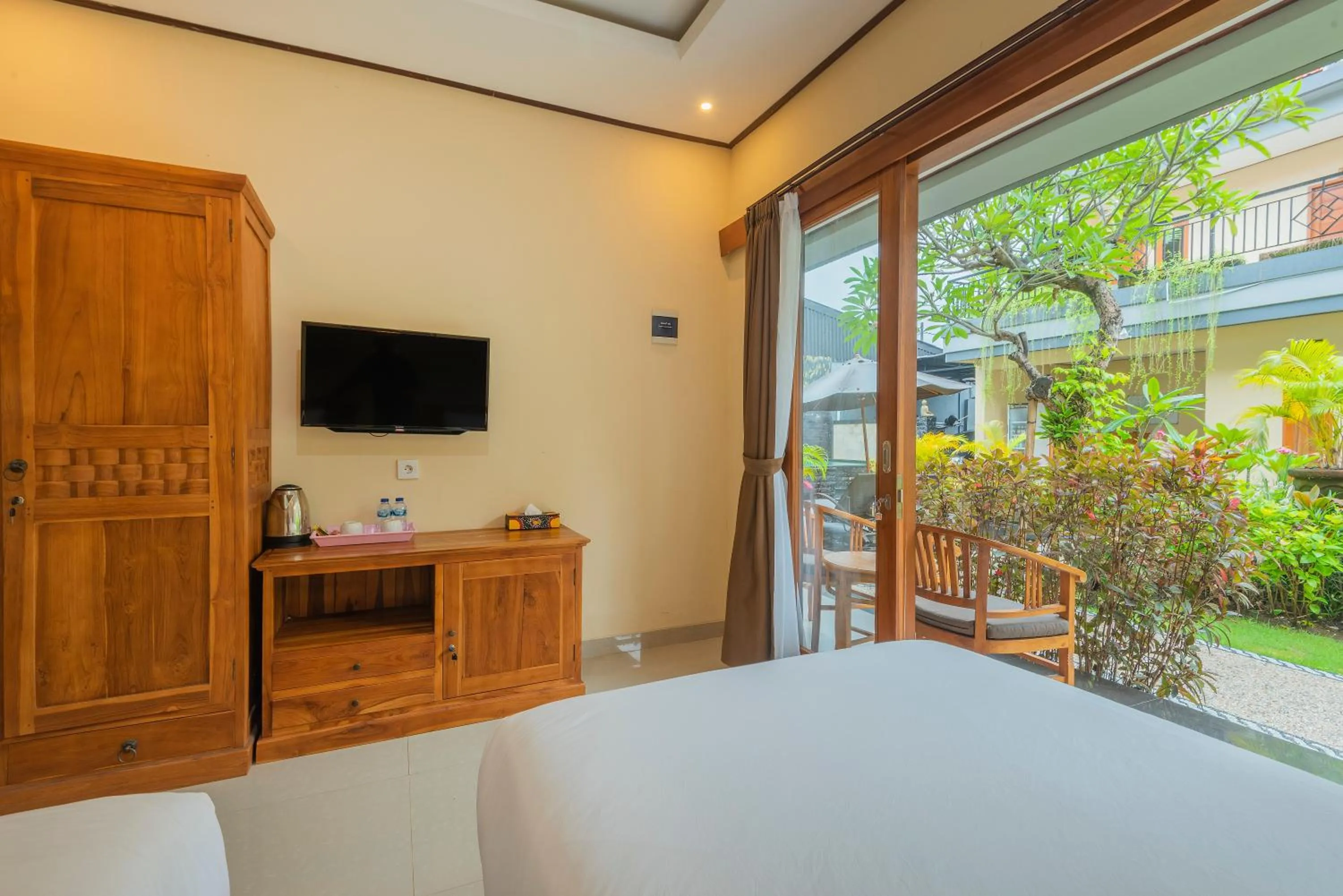 Bed in Liliy Guest House Legian