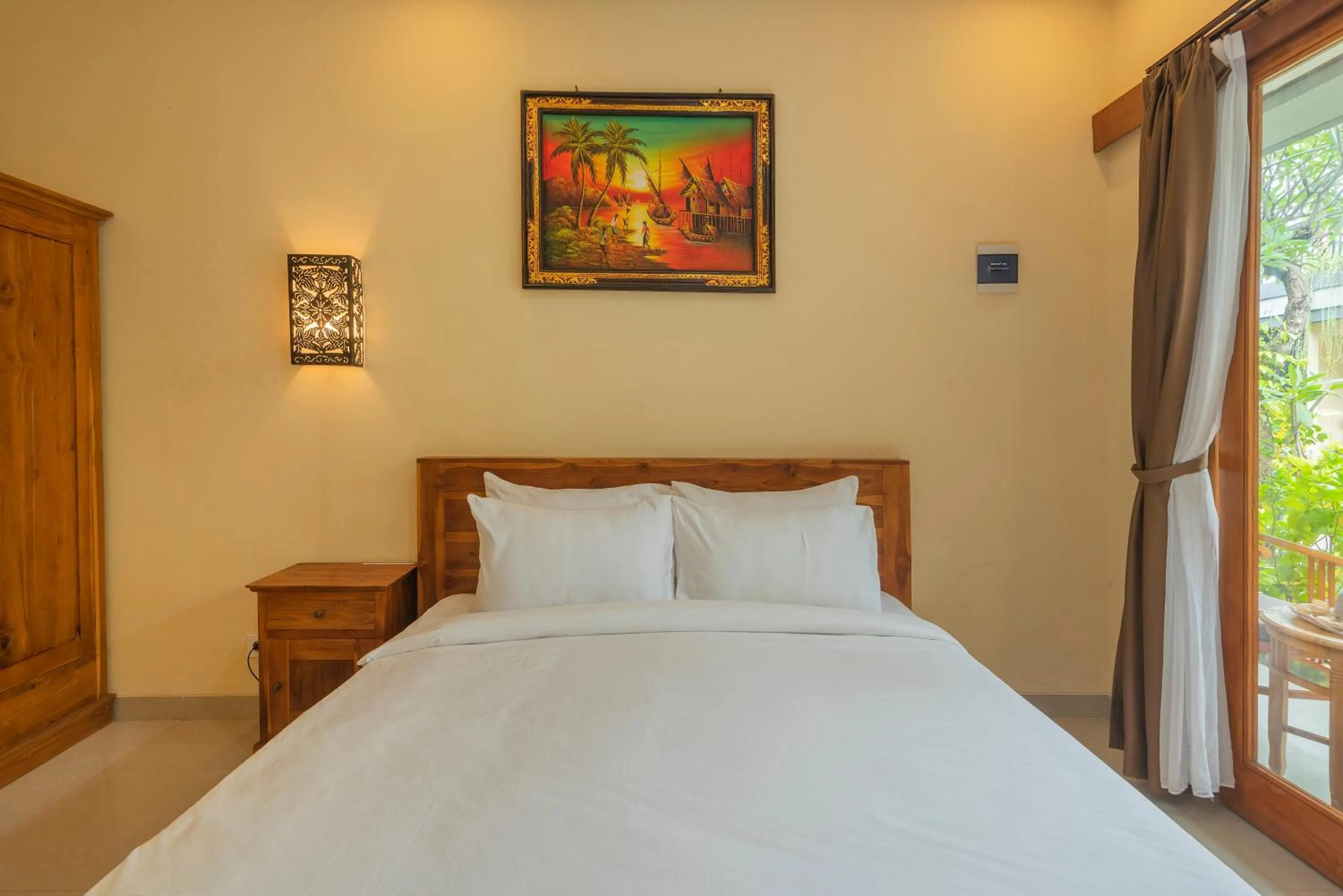 Bed in Liliy Guest House Legian