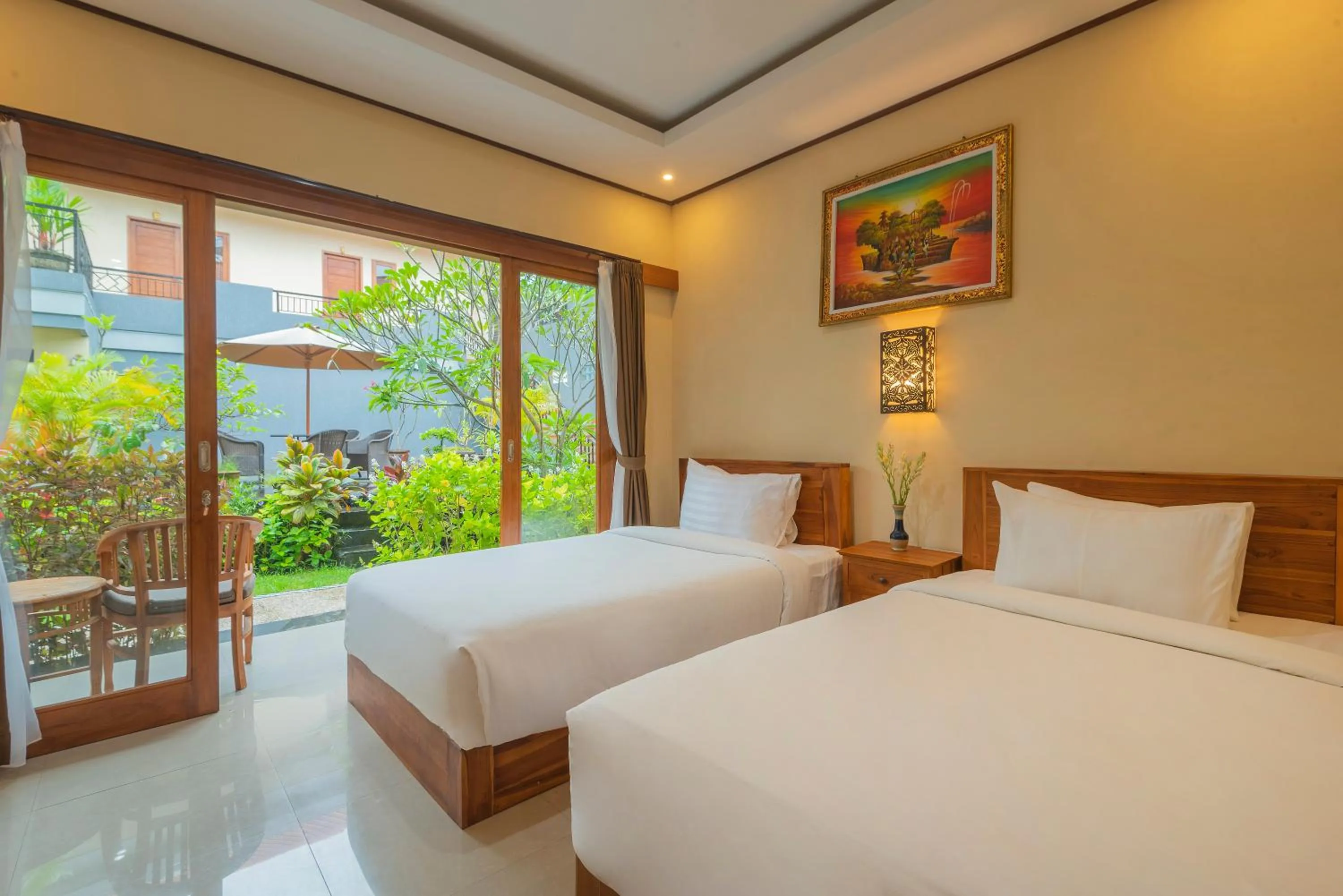 Bed in Liliy Guest House Legian