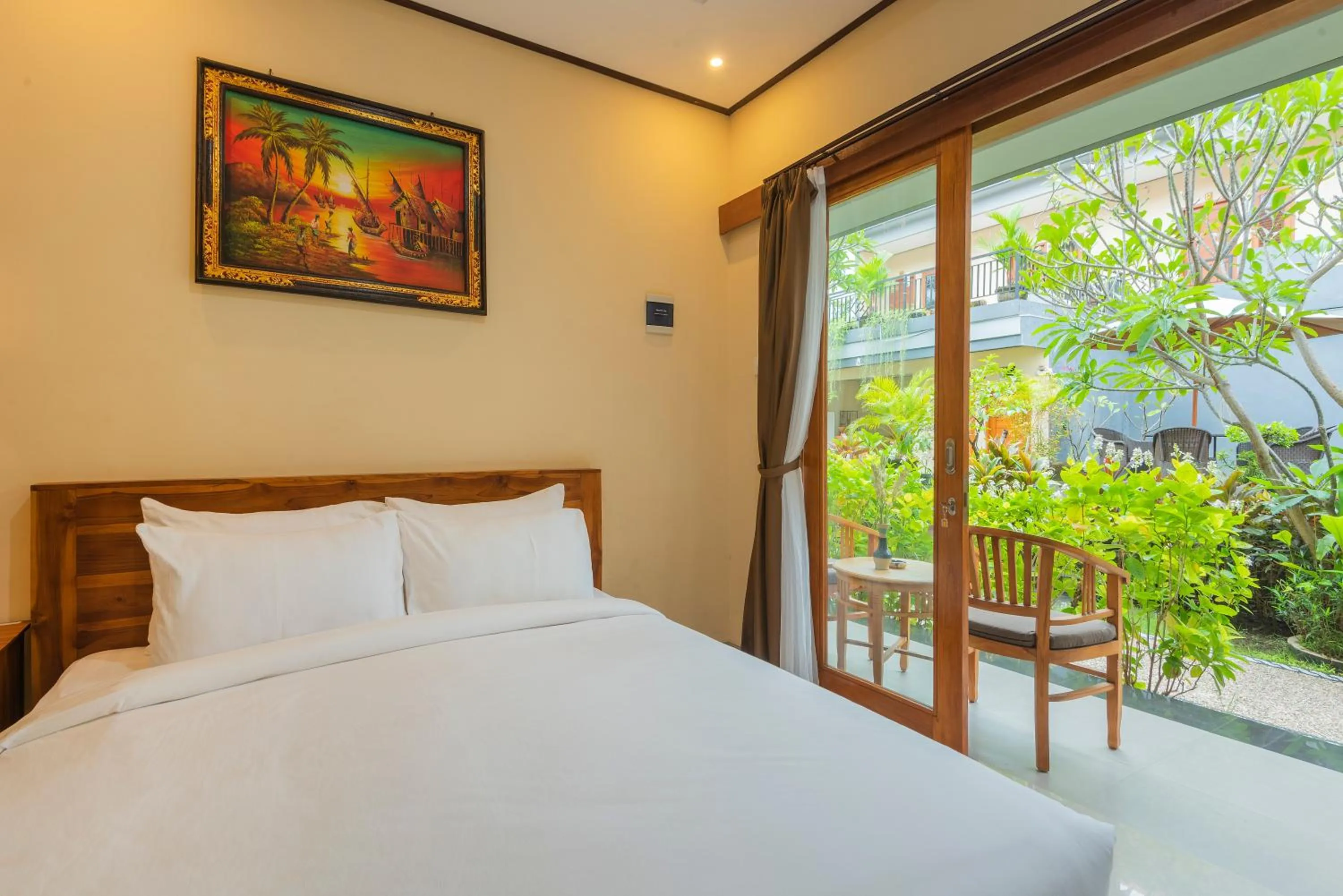 Bed in Liliy Guest House Legian