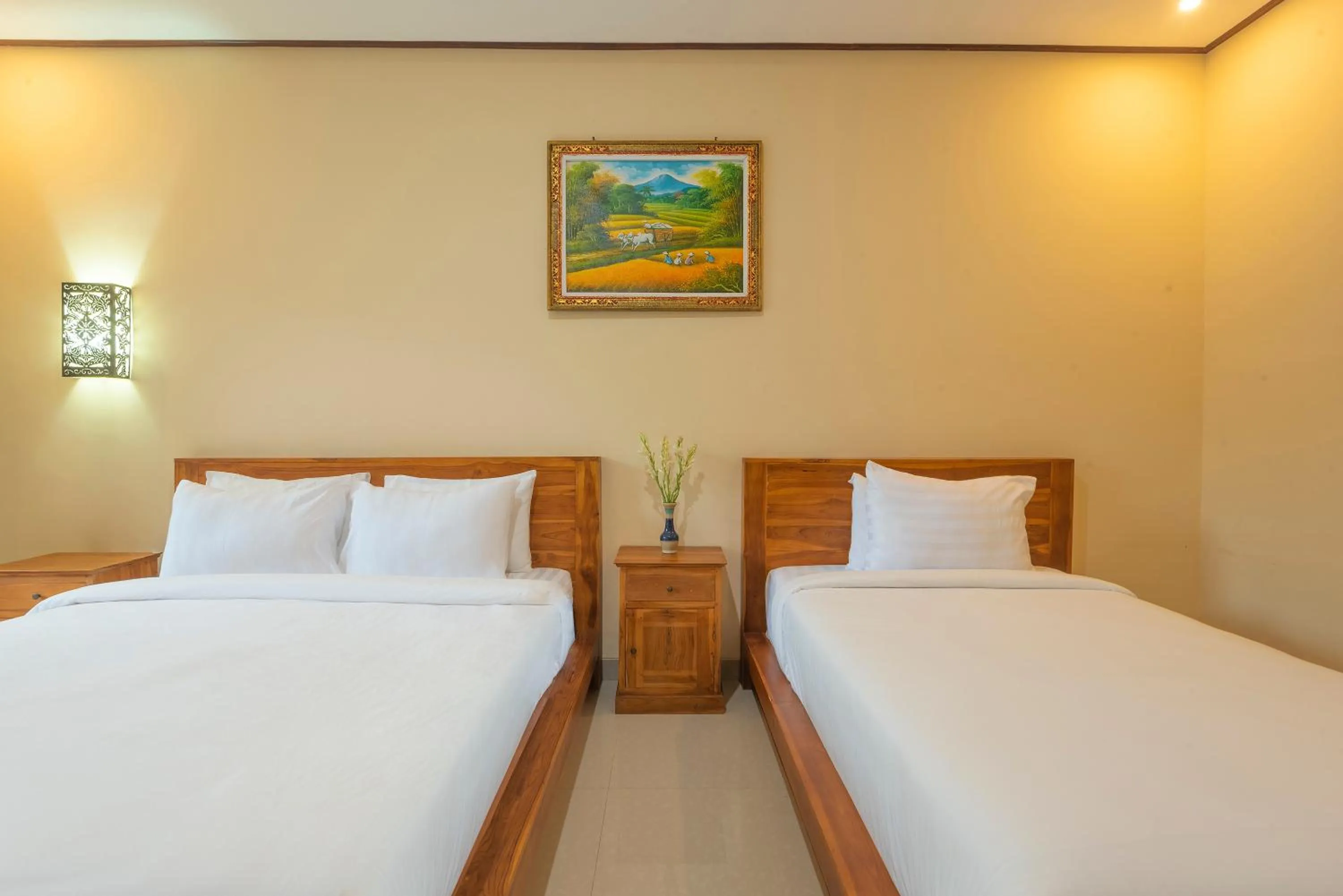 Bed in Liliy Guest House Legian