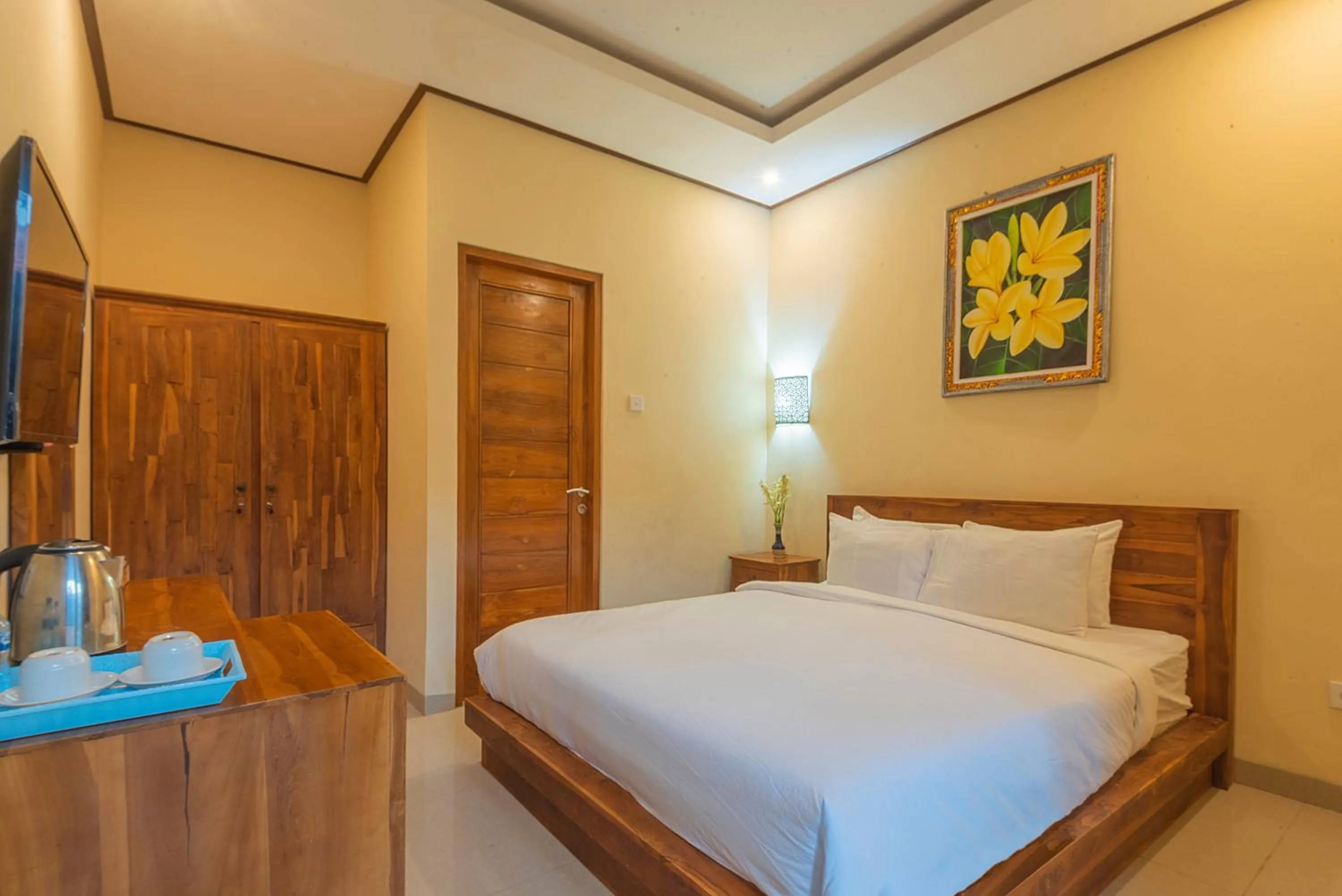 Bed in Liliy Guest House Legian