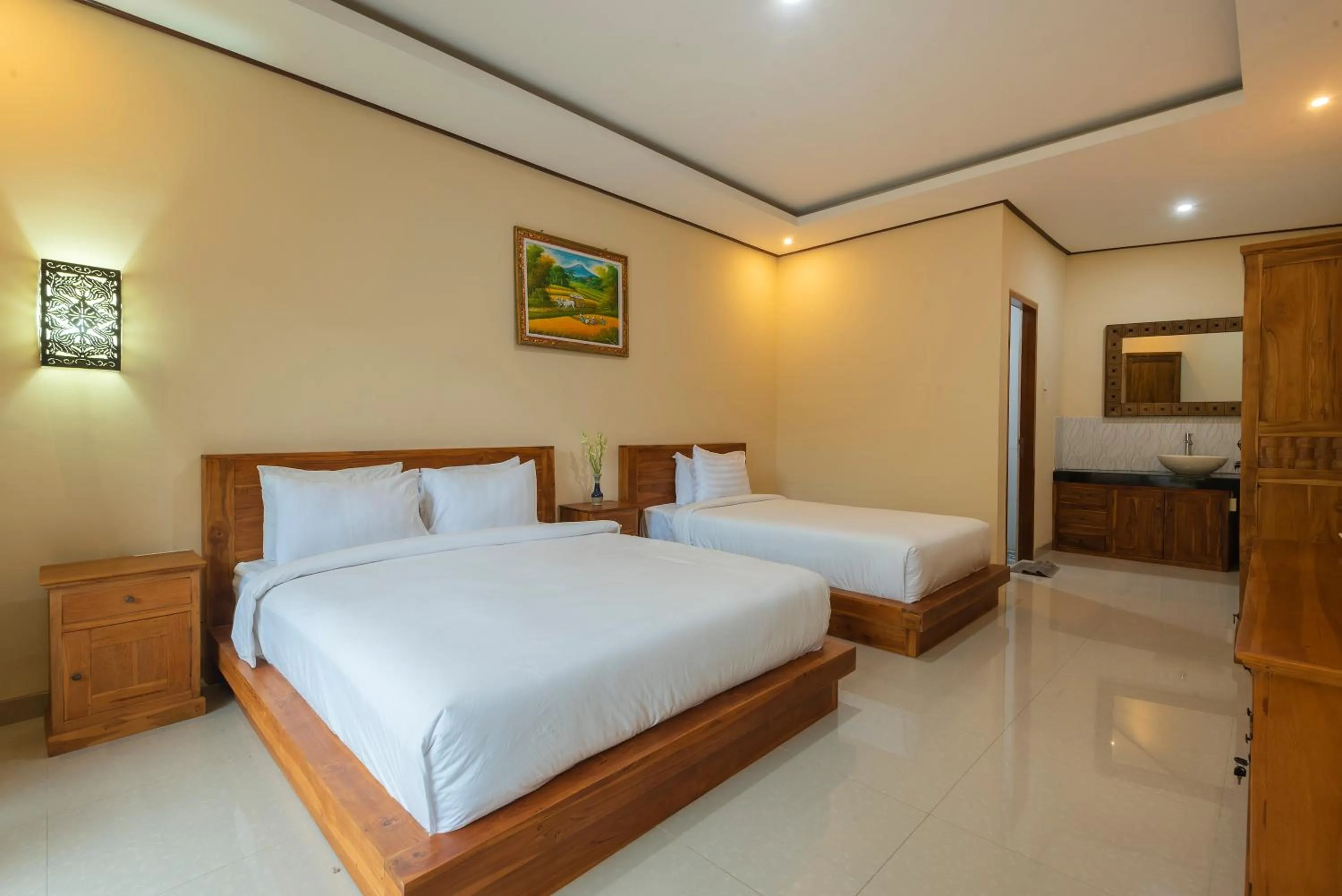 Bed in Liliy Guest House Legian