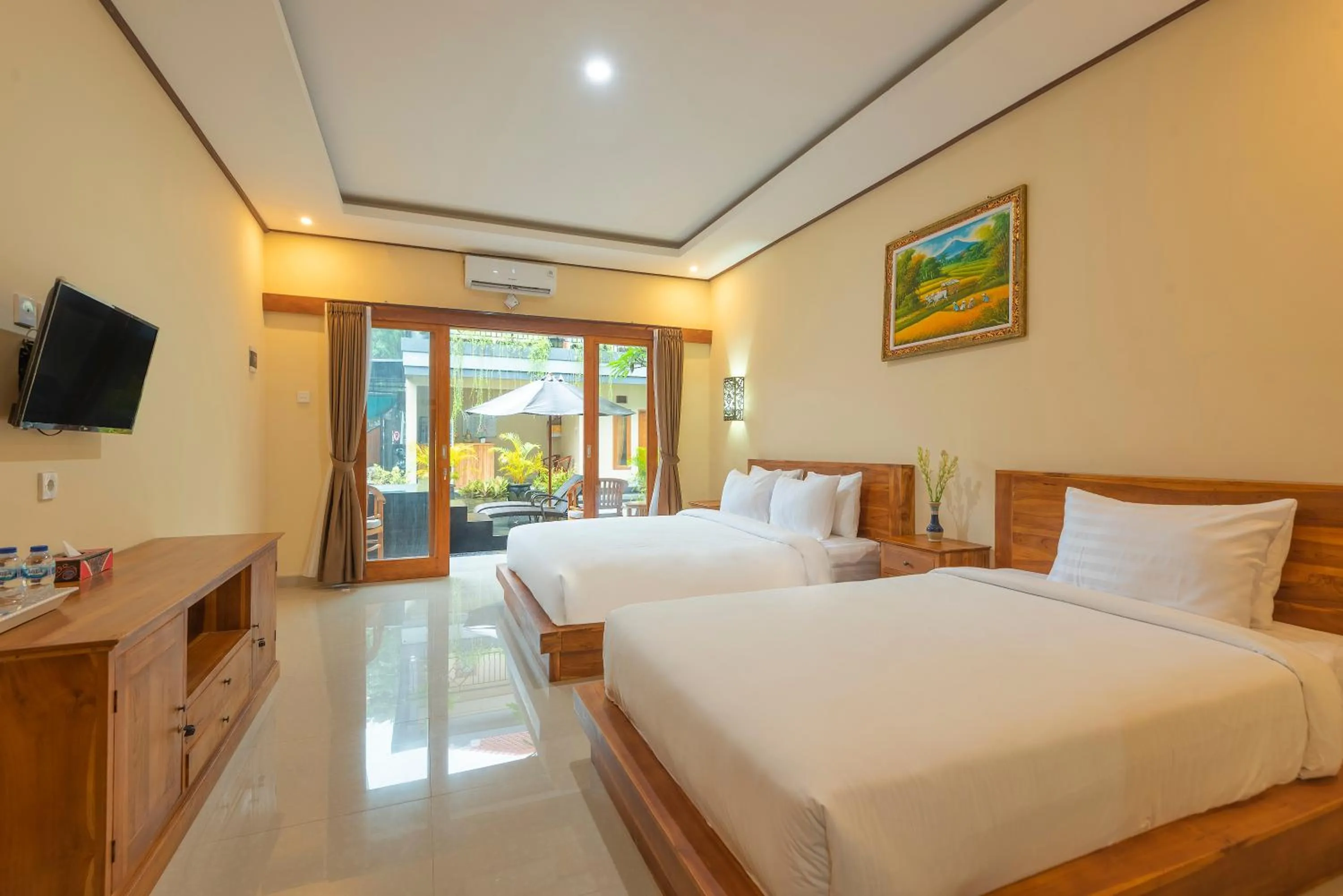 Bed in Liliy Guest House Legian