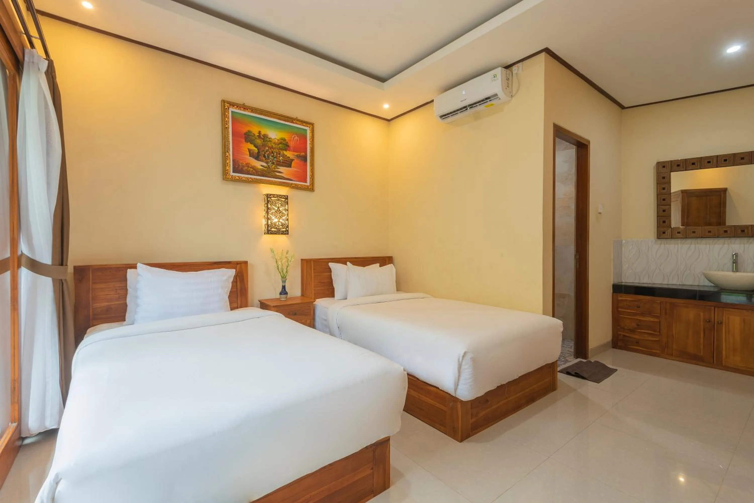 Bed in Liliy Guest House Legian